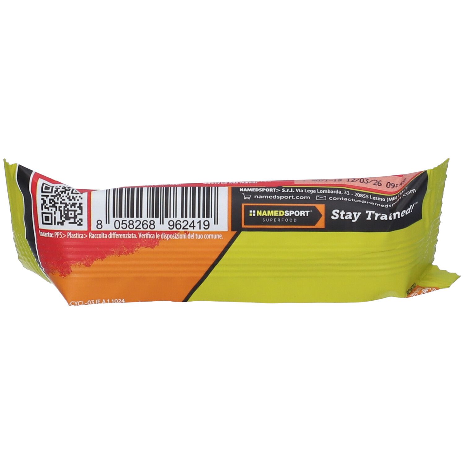 Retro della barretta. Confezione gialla con codice a barre, testo e logo del marchio.