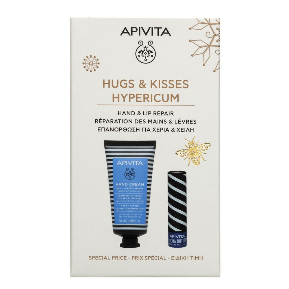 Set regalo con crema mani e balsamo labbra. Tubo di crema e stick di balsamo accanto alla confezione con nome del prodotto.