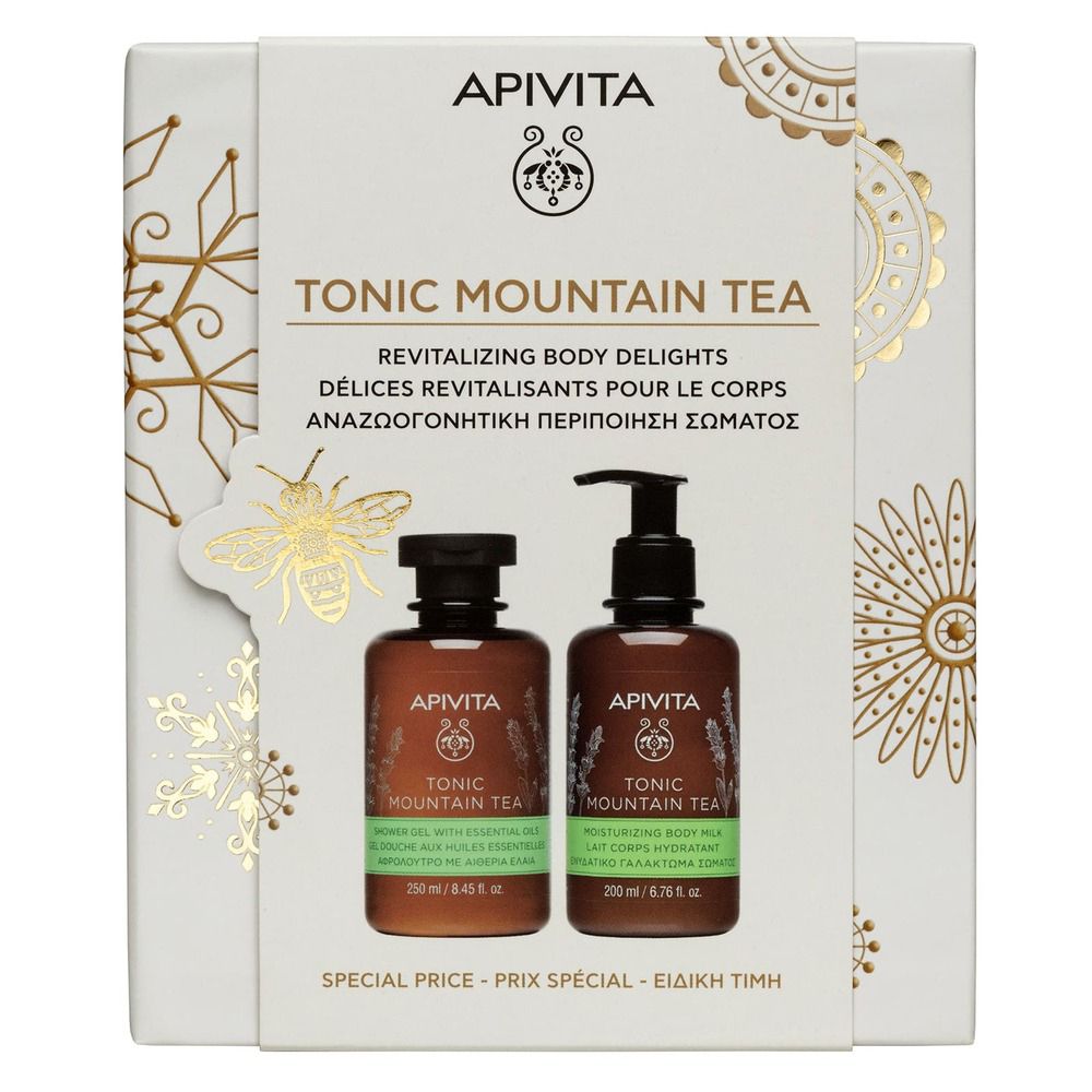 Confezione regalo con due bottiglie in una scatola. Scritta: Tonic Mountain Tea. Ornamenti dorati e un'ape.