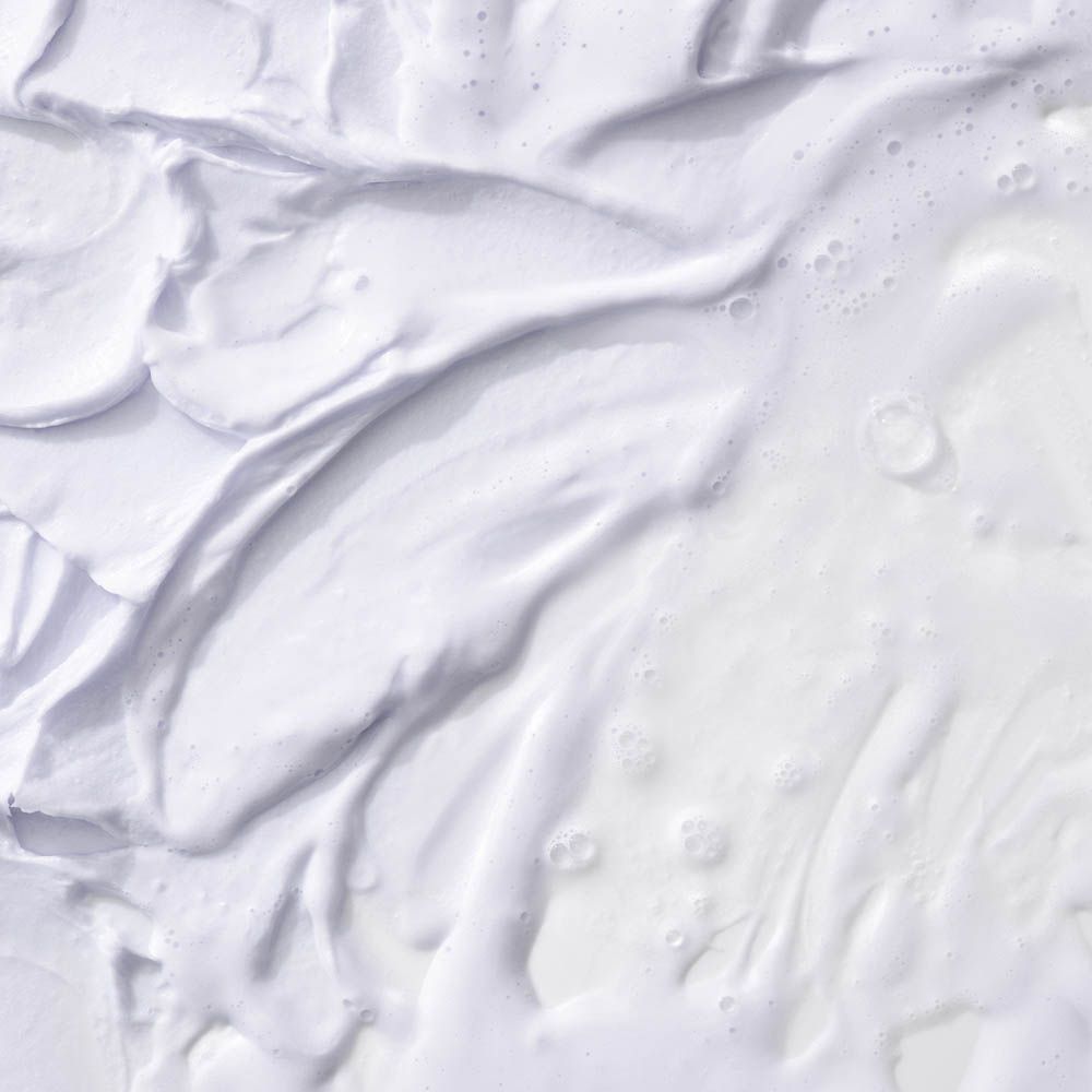 Campione di texture di crema idratante Clinique con bollicine.