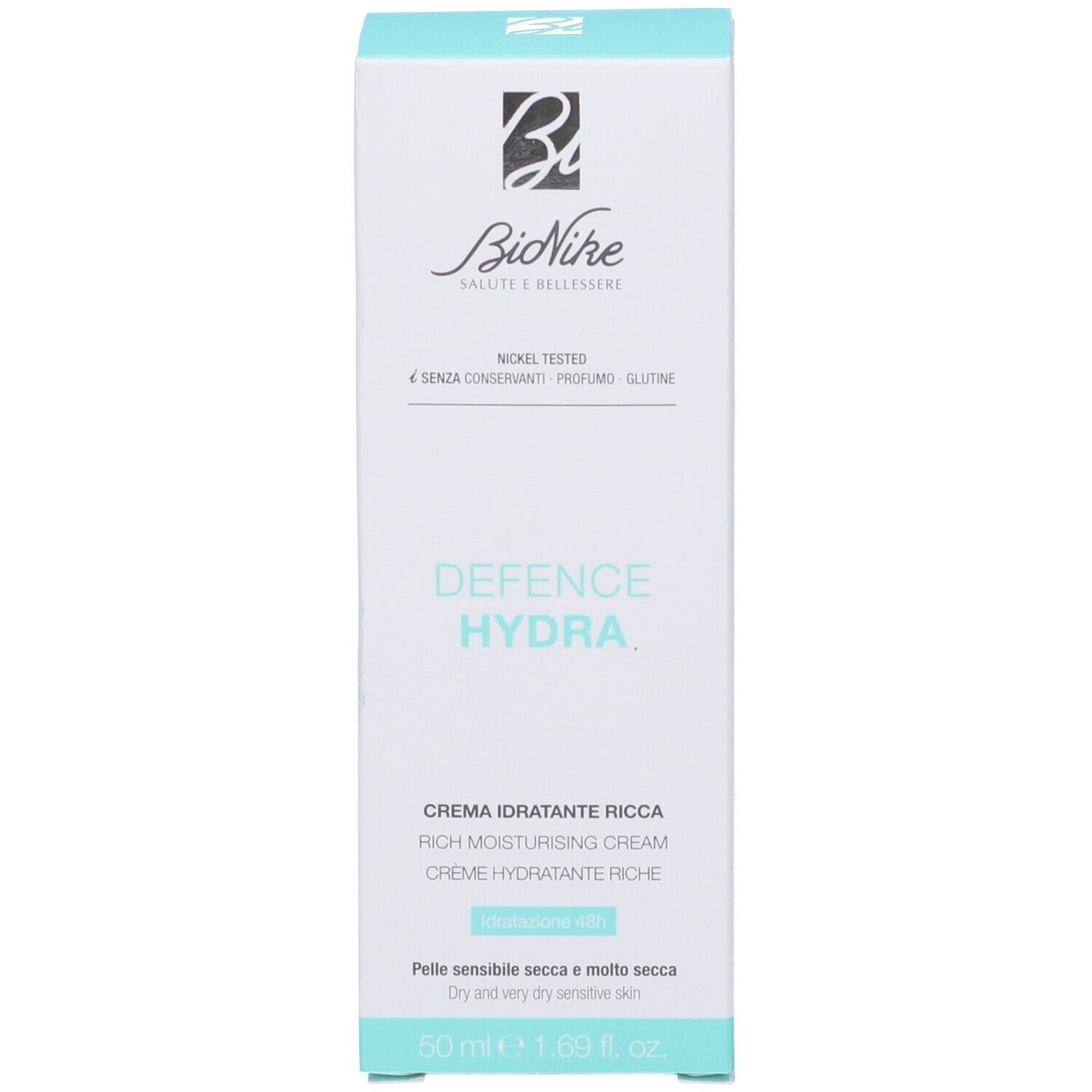 Confezione bianca con accenti turchesi. Scritta: Defence Hydra, Crema Idratante Ricca. Marchio: Bionike. Nickel Tested.