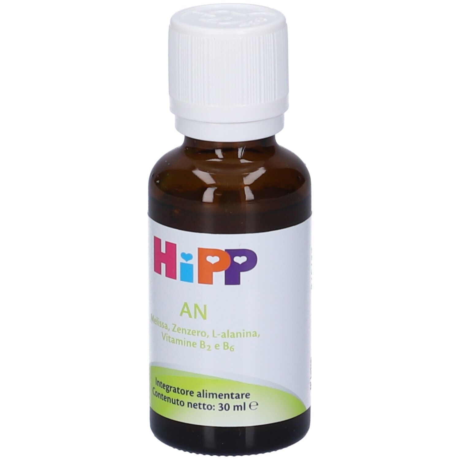 Flacone di vetro marrone con tappo bianco. Etichetta con nome del prodotto, ingredienti e volume. Etichetta verde e bianca in basso.