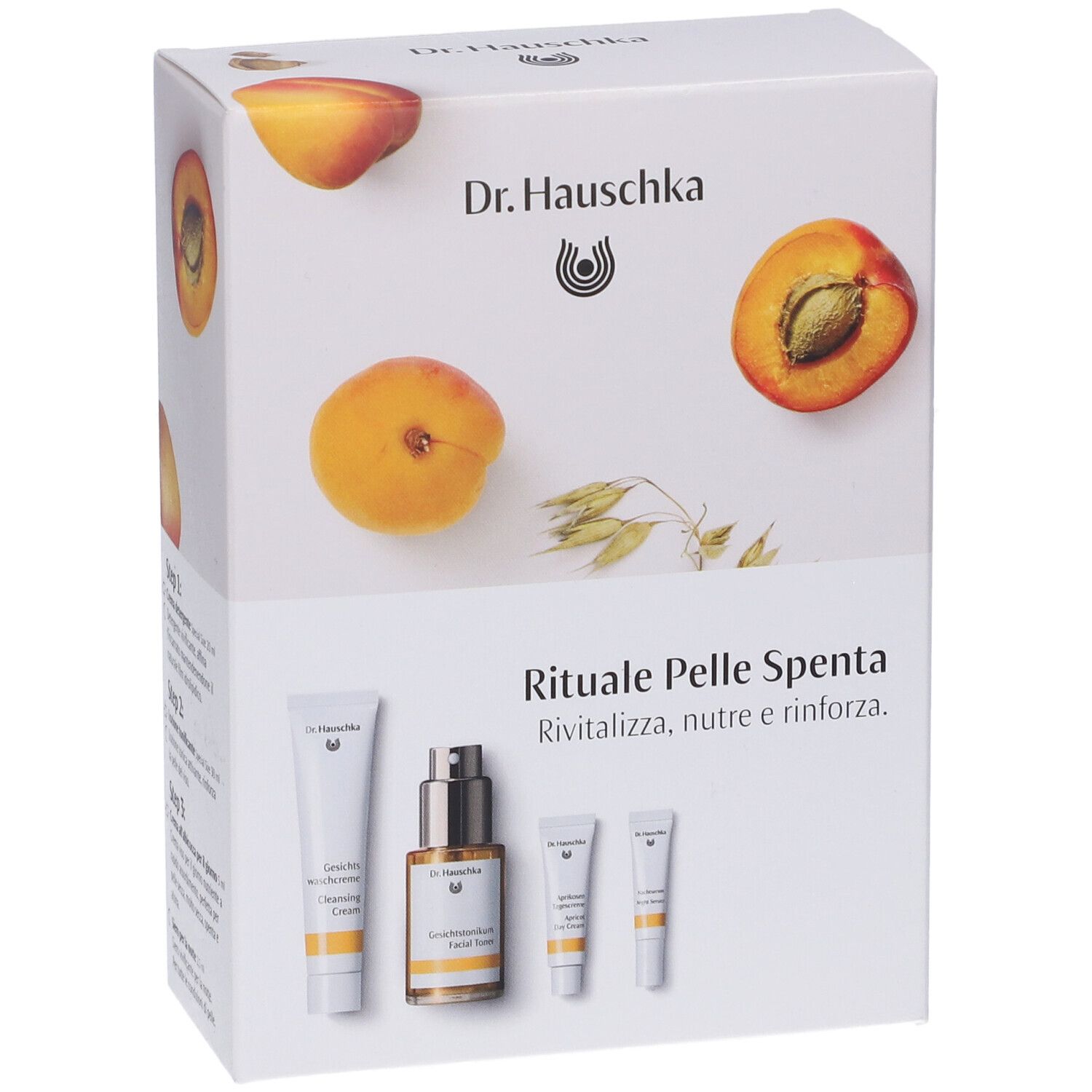Confezione di cosmetici. Scritte: Dr. Hauschka, Rituale Pelle Spenta. Prodotti e immagini di albicocche.