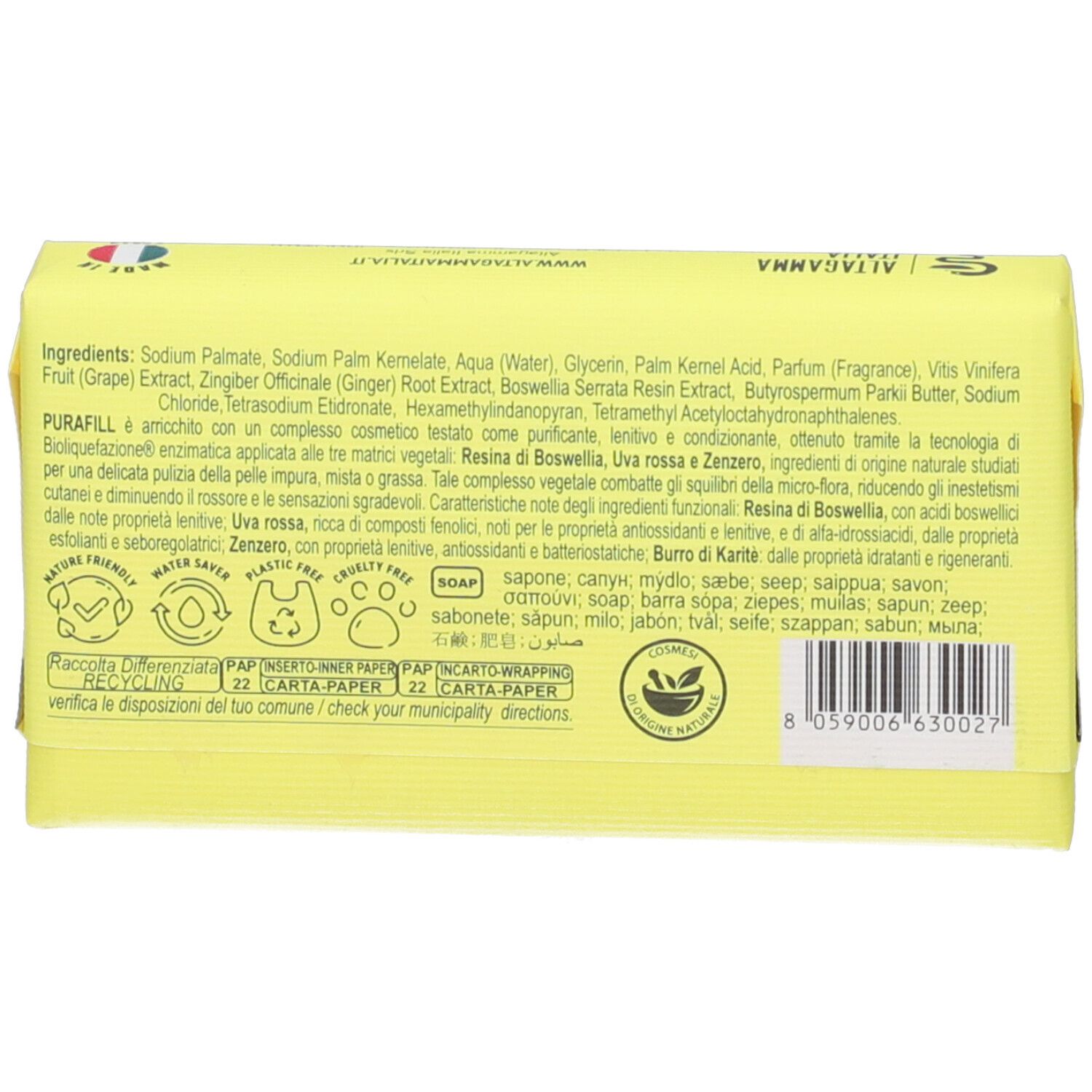 Confezione di sapone gialla con elenco ingredienti, sigillo cosmetico naturale e simboli di riciclo.