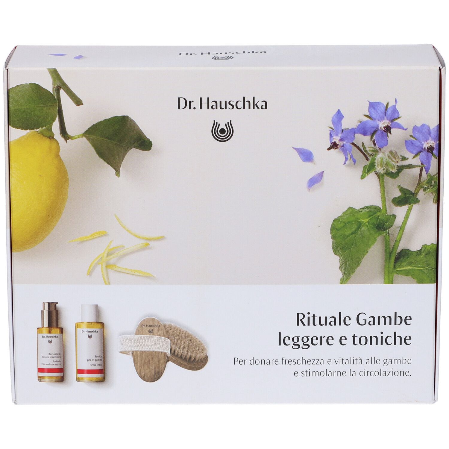 Confezione in cartone con immagini del prodotto e testo. Mostra due flaconi, una spazzola, un limone e fiori. Testo: Rituale Gambe leggere e toniche.