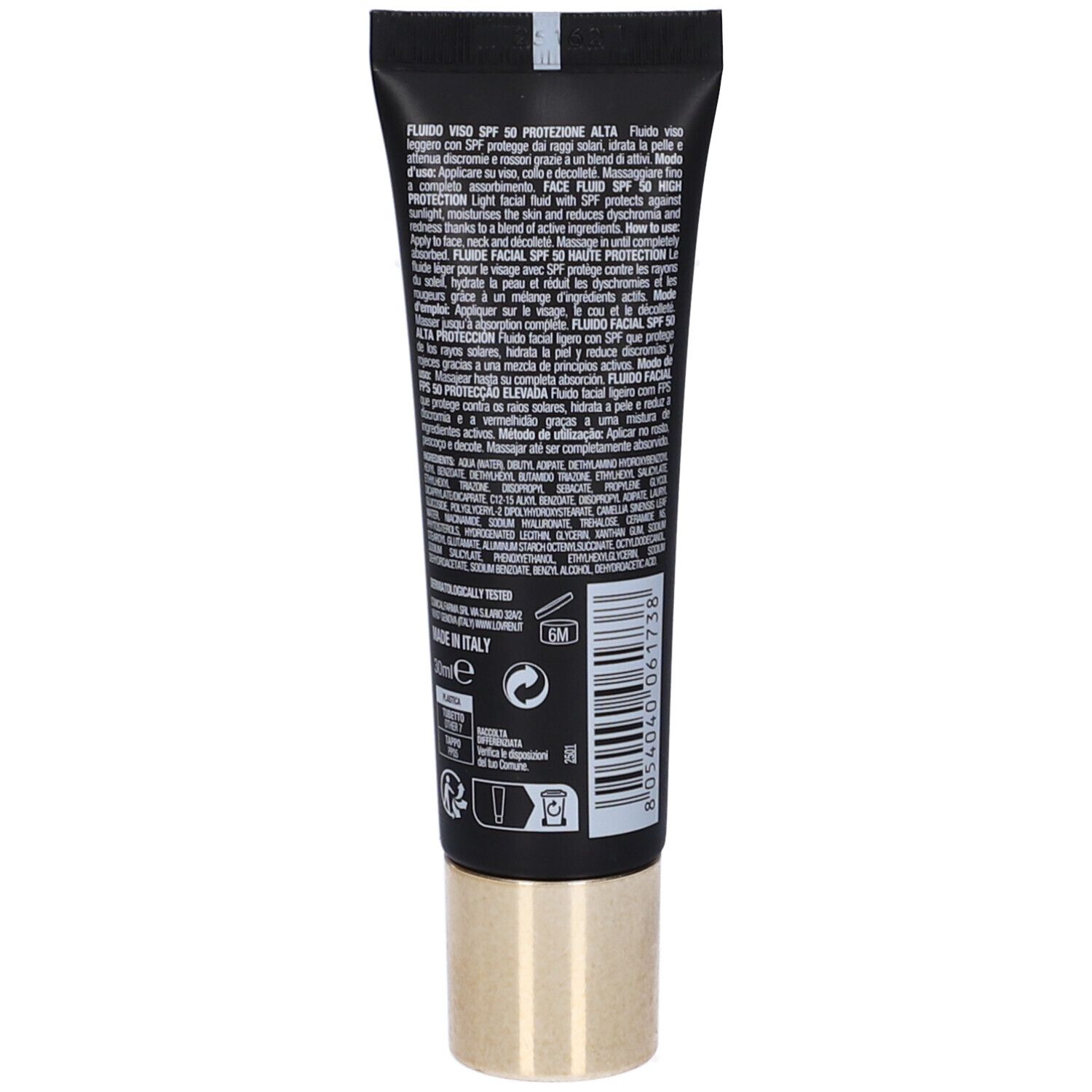 Retro del tubo nero. Testo multilingue. Tappo dorato. Loghi e simboli.