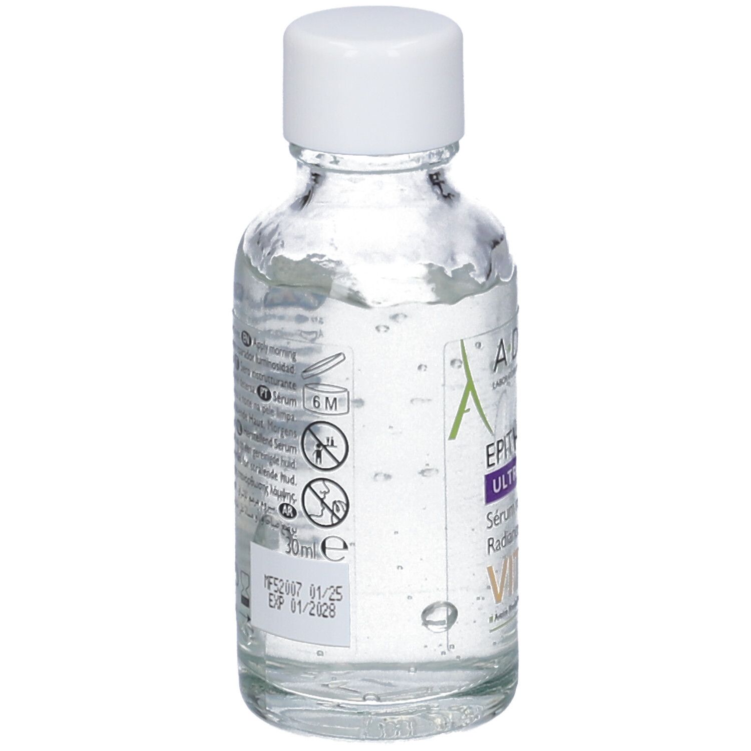 Retro del flacone in vetro. Testo multilingue. 30ml, scadenza, numero di lotto.