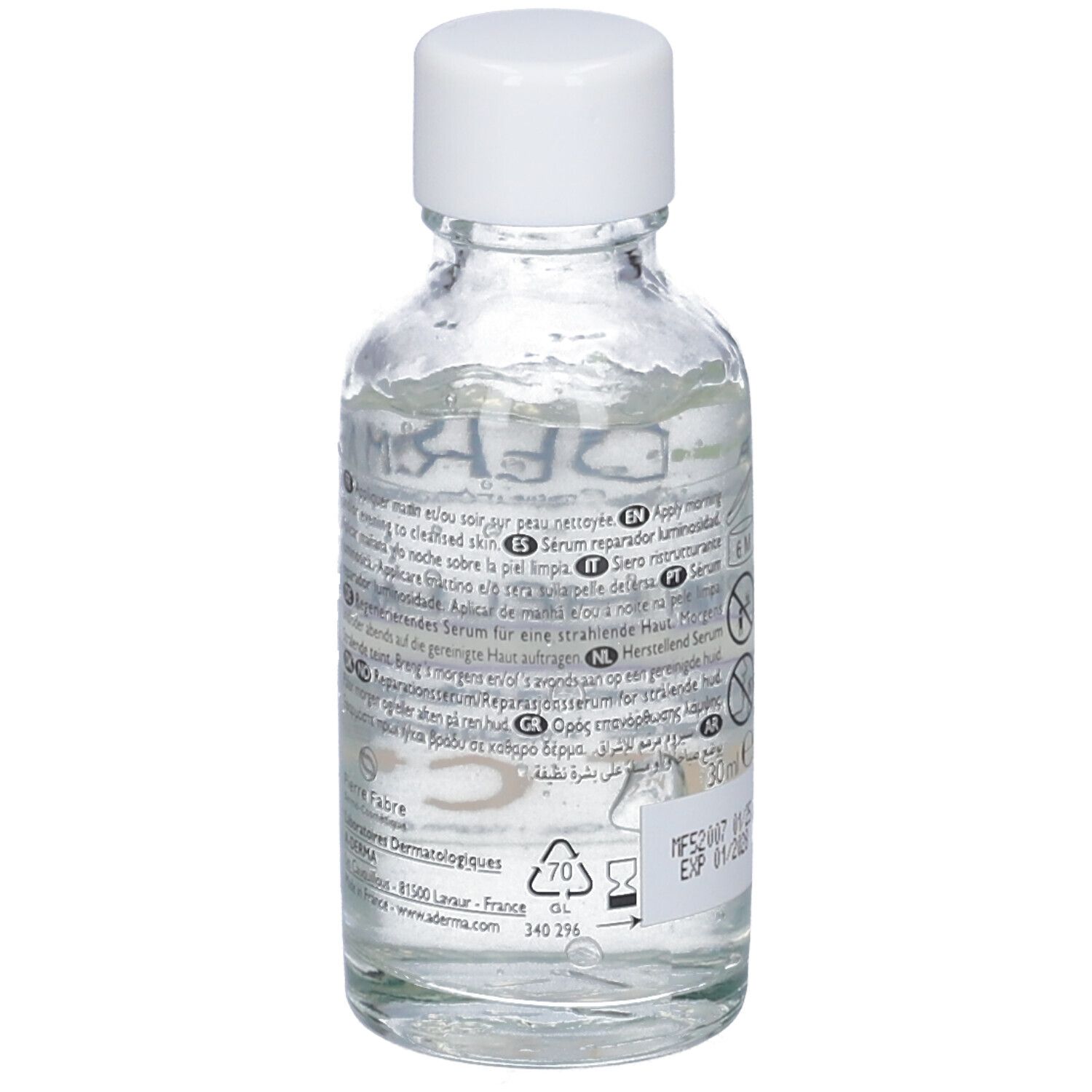 Retro del flacone in vetro. Testo multilingue. 30ml, scadenza, numero di lotto.