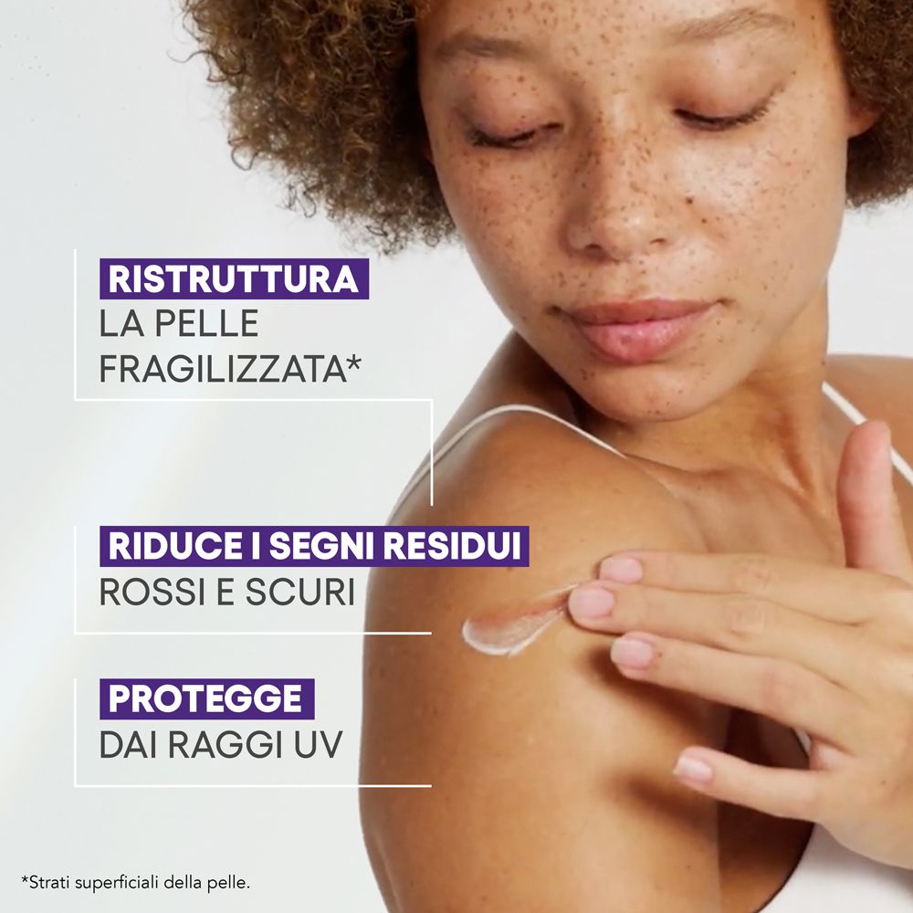 Donna con pelle. Testo: Ristruttura la pelle fragilizzata, Riduce i segni residui rossi e scuri, Protegge dai raggi UV.