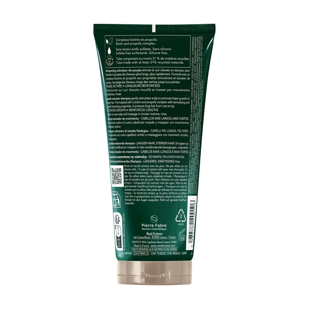 Retro di un tubo di shampoo verde. Testo e loghi. Contiene informazioni sugli ingredienti e il riciclaggio.