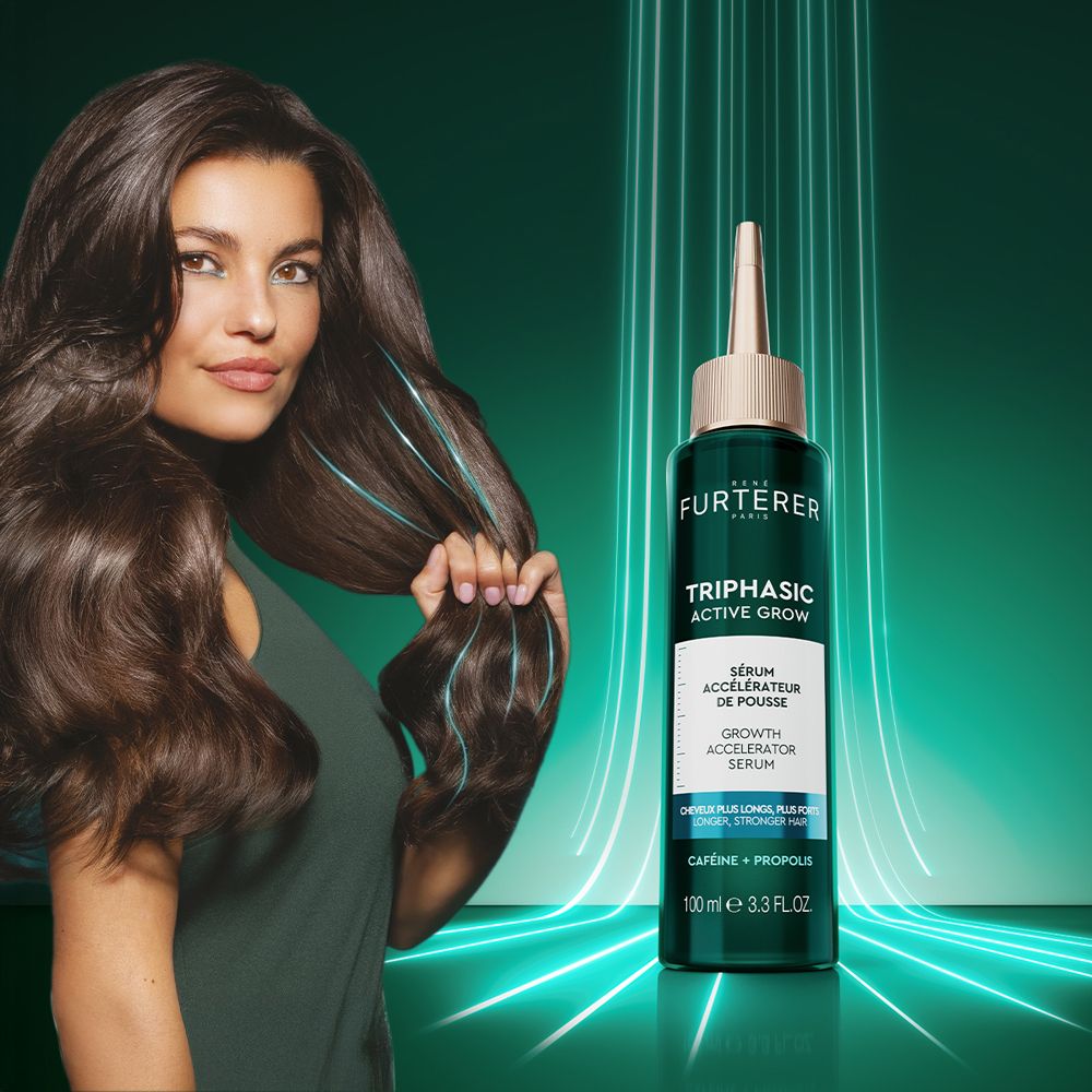 Donna con capelli lunghi. Flacone con testo: Triphasic Active Grow, Growth Accelerator Serum.