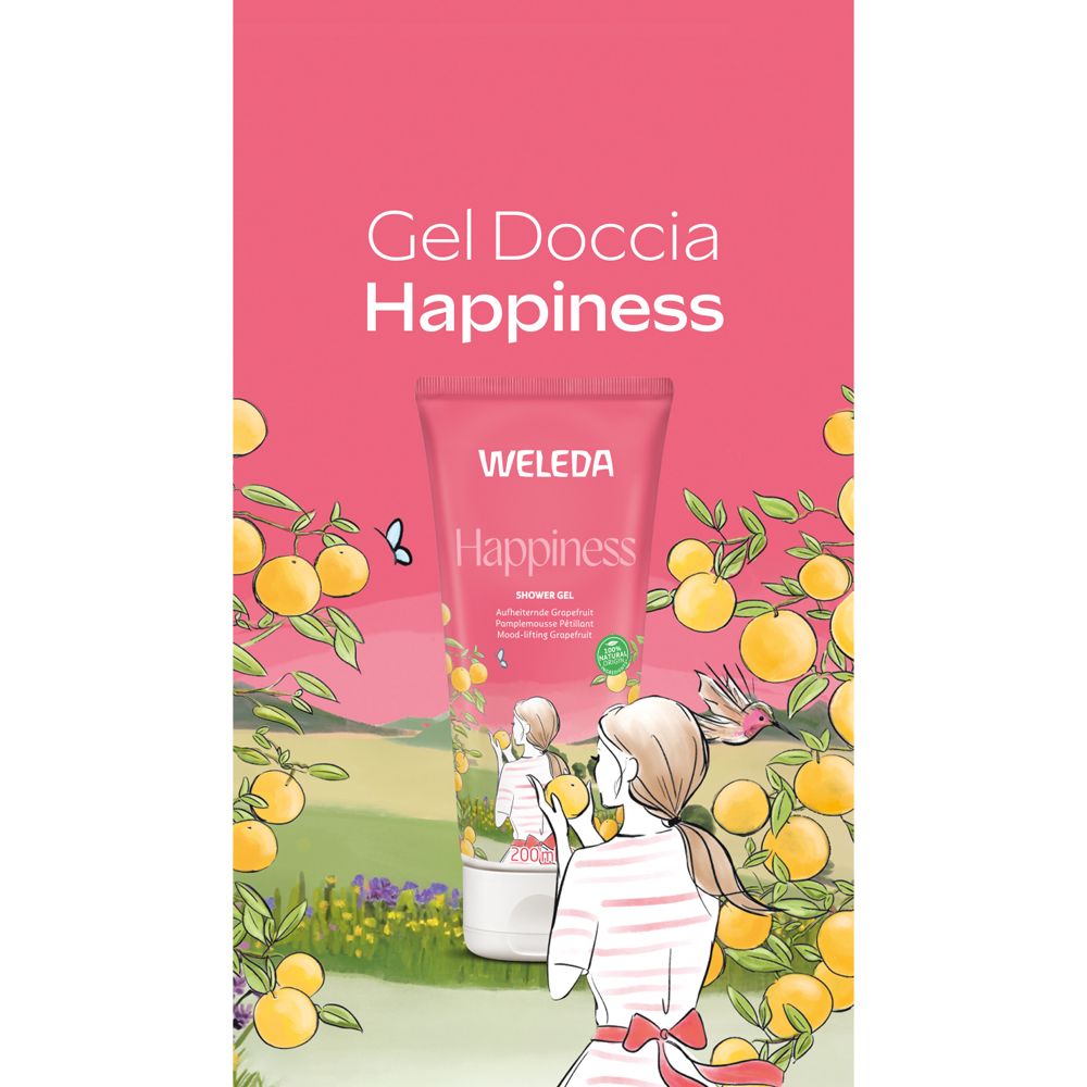 Immagine pubblicitaria con sfondo rosa. Prodotto WELEDA Happiness gel doccia. Illustrazione di una donna sotto alberi di limoni. Testo: Gel Doccia Happiness.