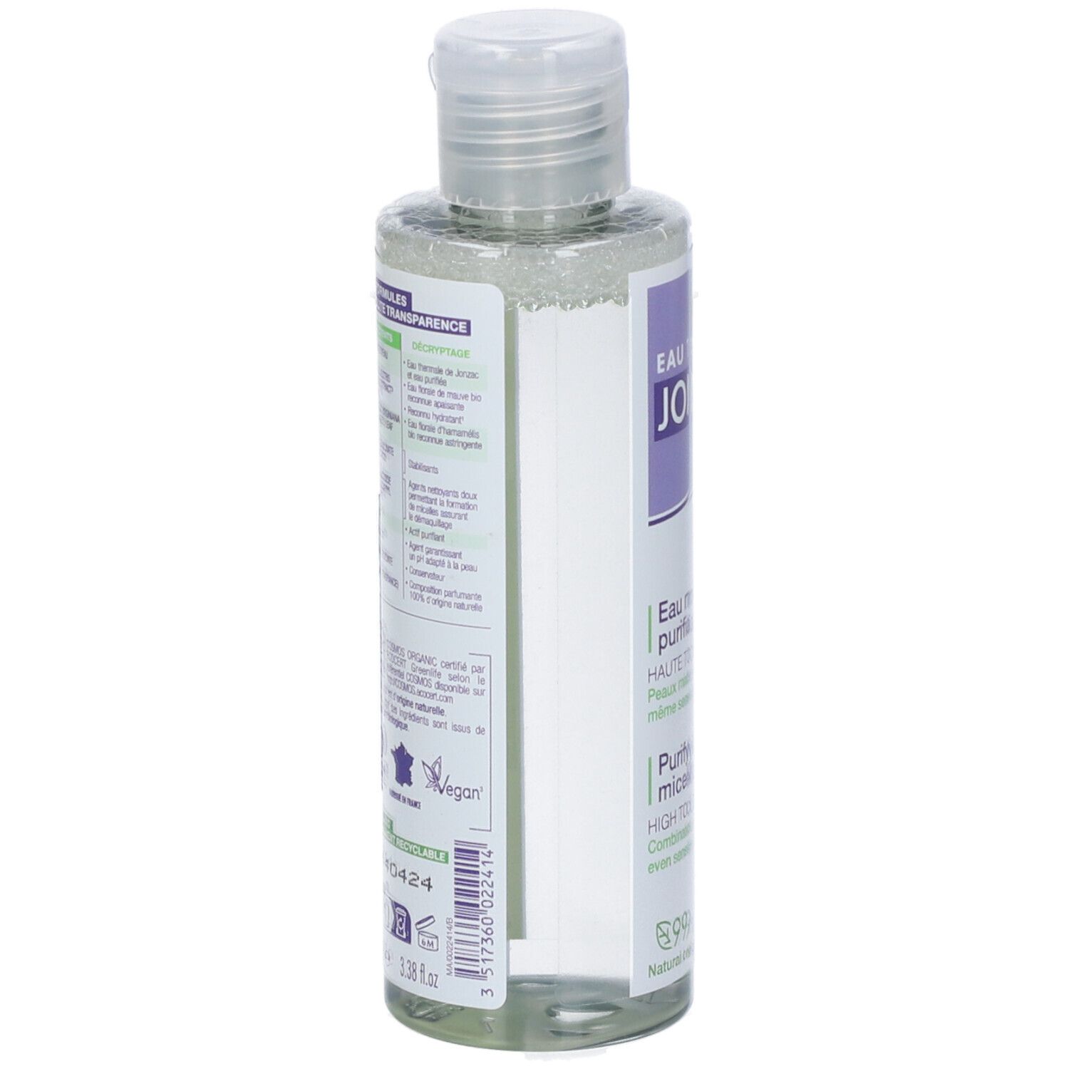 Flacone trasparente con tappo bianco. Etichetta con testo e loghi. Logo Vegan.