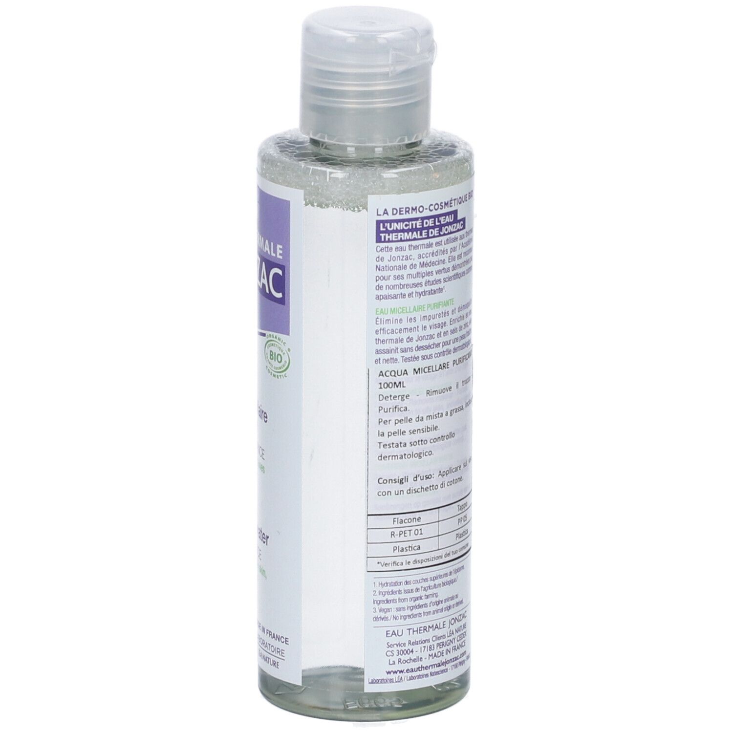 Flacone trasparente con tappo bianco. Etichetta con testo e loghi. Testo: Acqua micellare purificante.