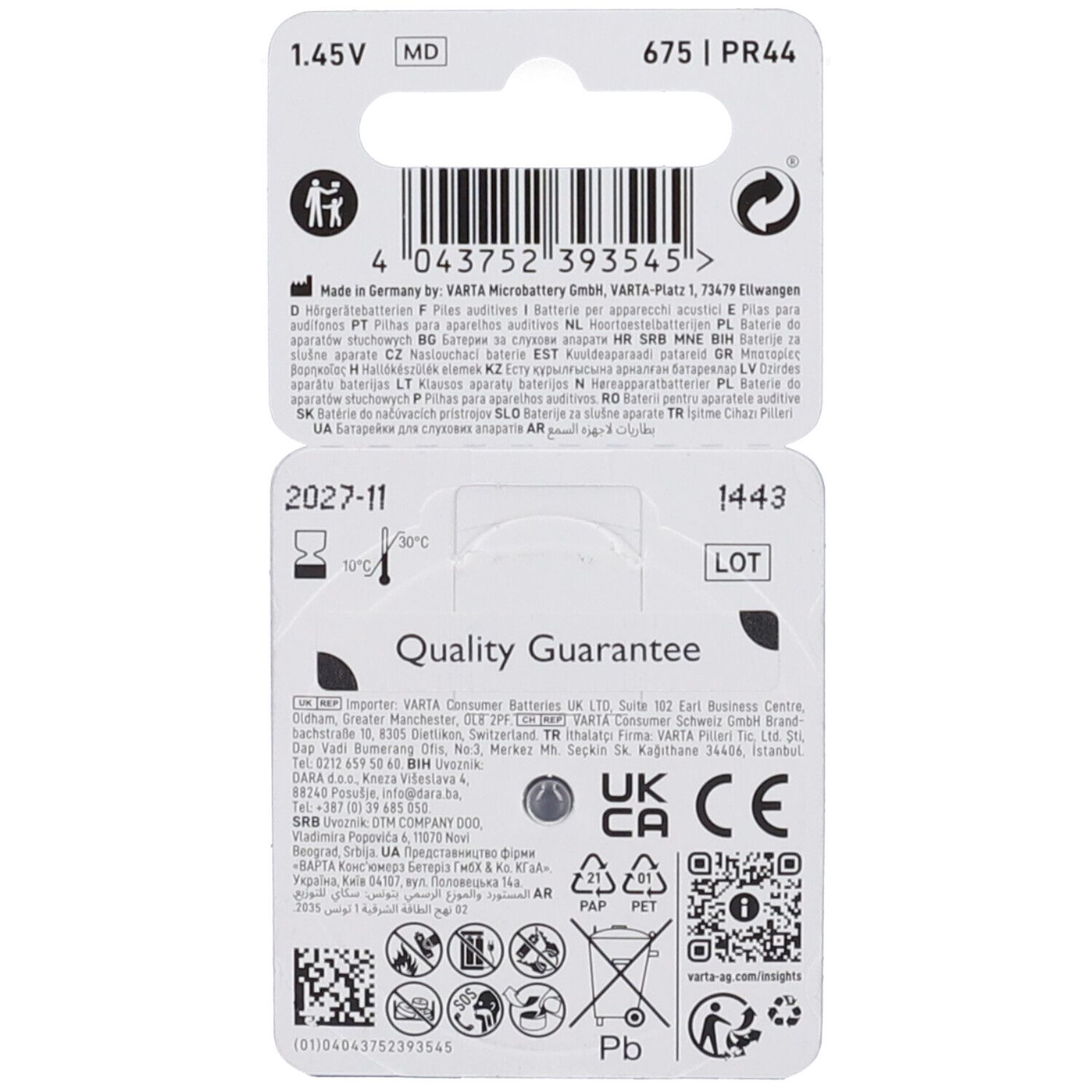 Retro della confezione delle batterie per apparecchi acustici. Informazioni sul produttore, garanzia di qualità, simboli di riciclaggio e marchio CE.