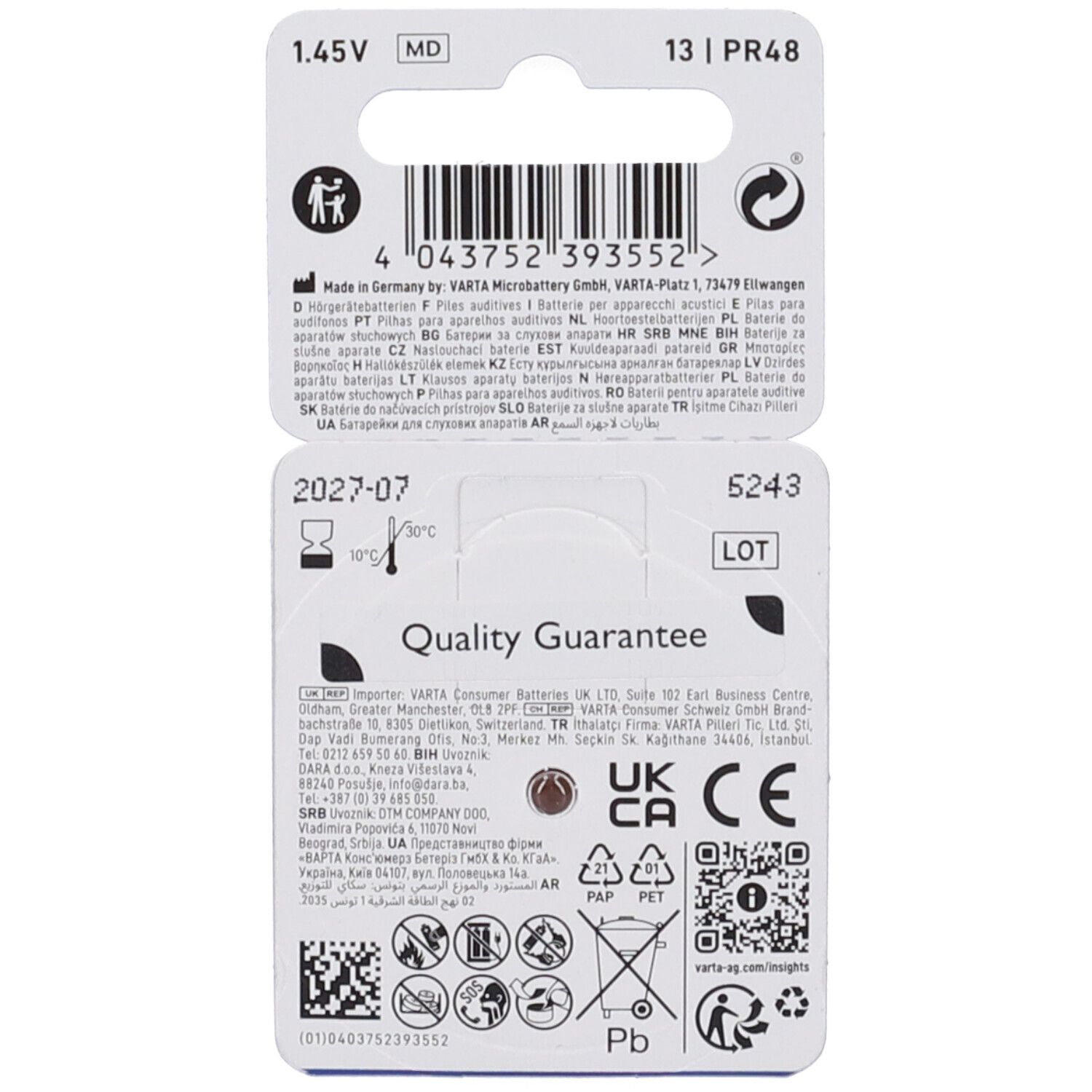 Retro della confezione delle pile per apparecchi acustici Varta. Informazioni sul produttore, garanzia di qualità, numero di lotto e simboli di riciclaggio.