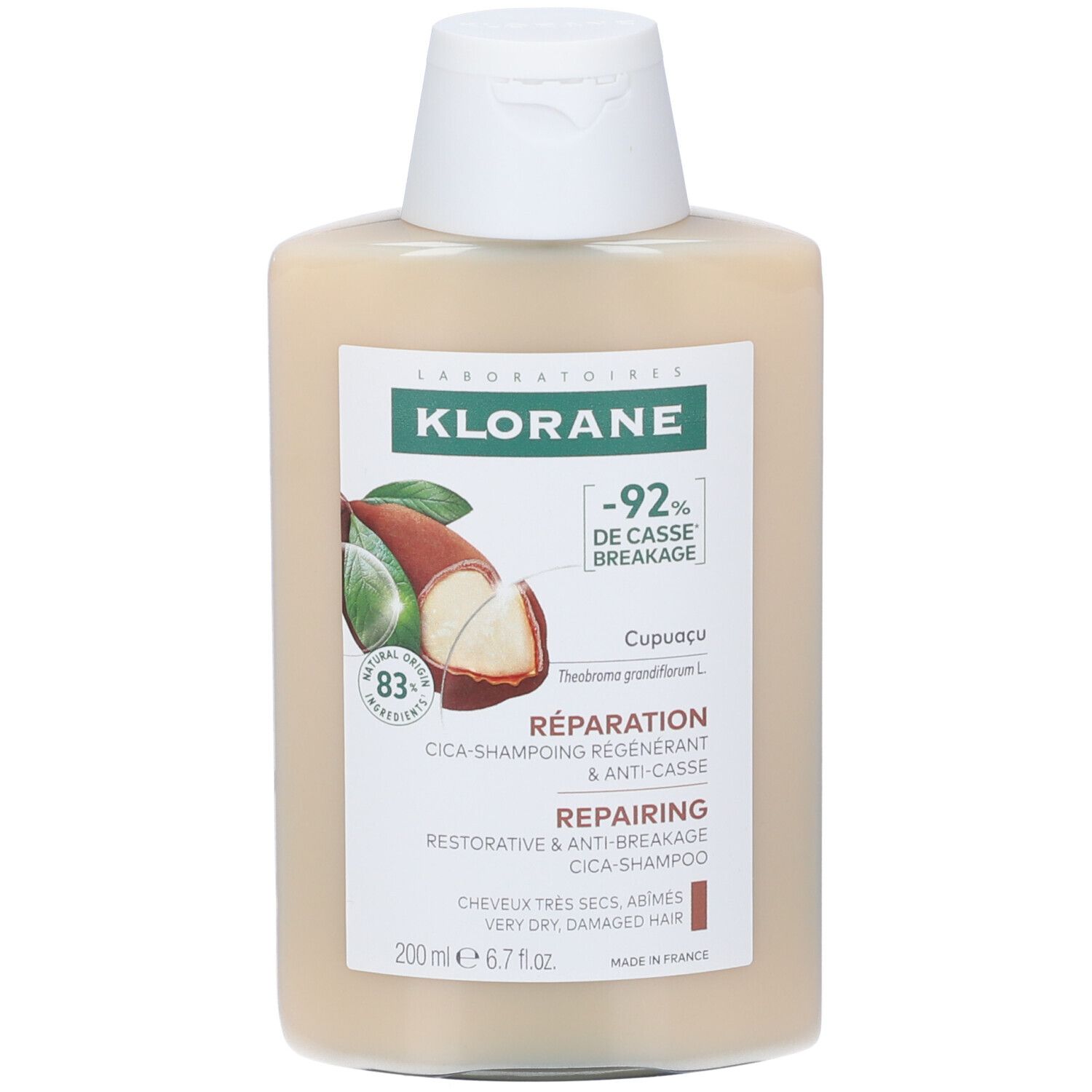 Flacone di shampoo Klorane Cica. Liquido beige, tappo bianco. Etichetta con informazioni e logo.