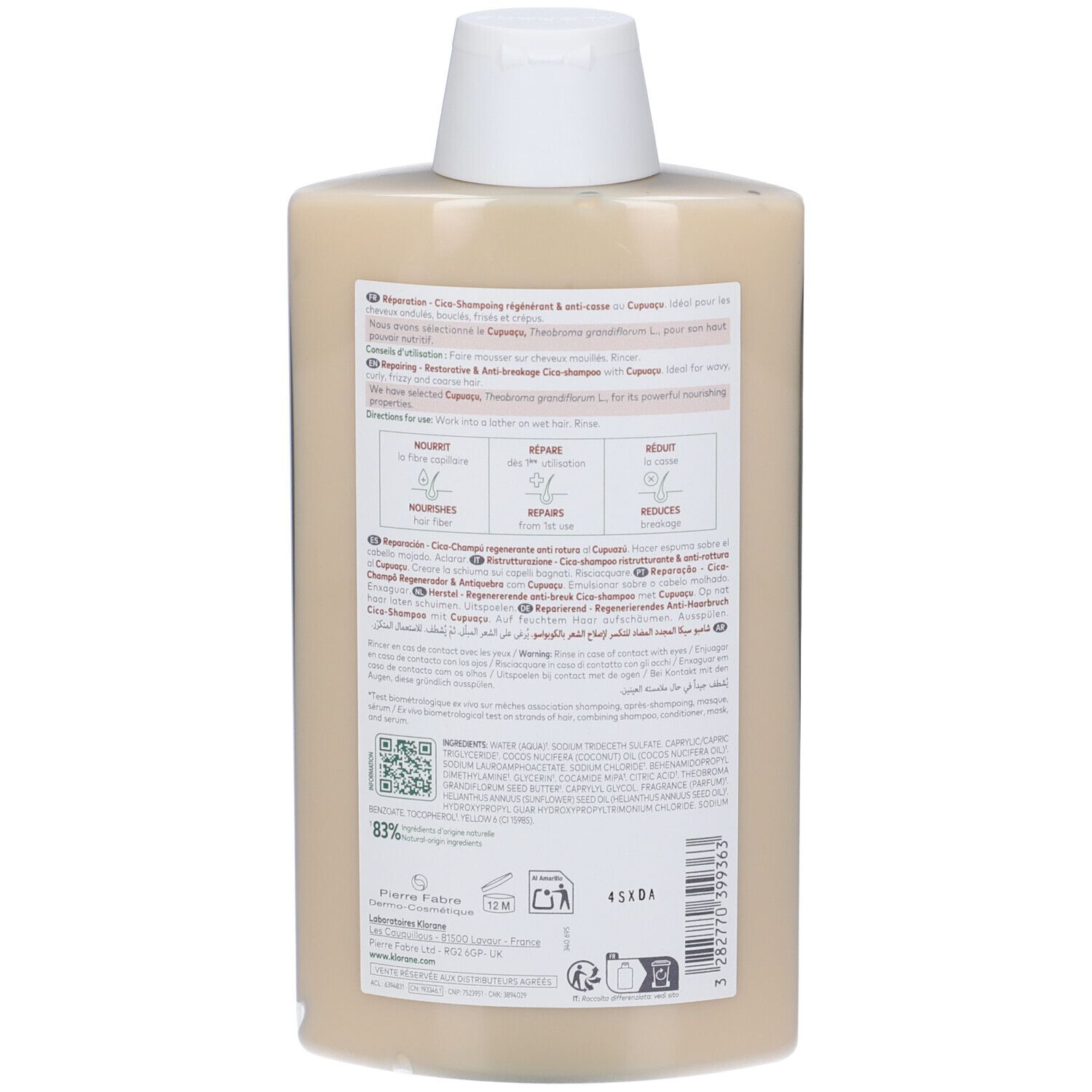 Retro del flacone di shampoo riparatore Klorane. Flacone beige con tappo bianco. Etichetta con informazioni.