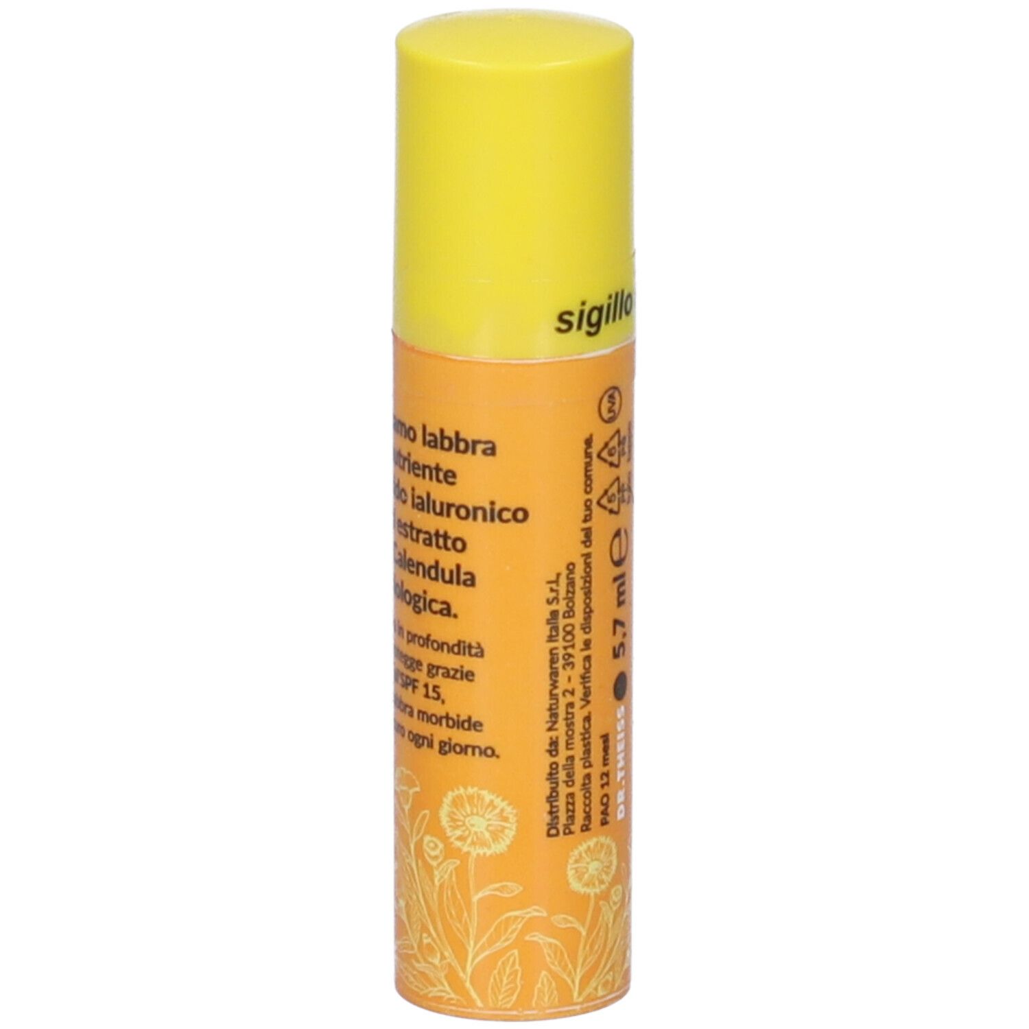 Stick balsamo labbra con tappo giallo. Scritta: Sigillo. Contiene 5,7 ml. Informazioni produttore e motivo floreale.