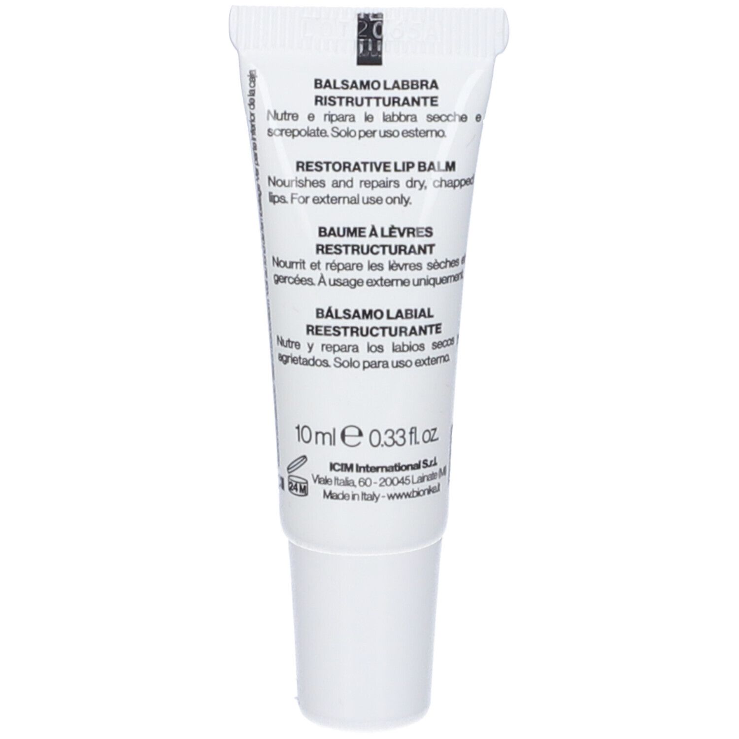 Retro del tubo. Testo multilingue: Balsamo Labbra, Restorative Lip Balm, Baume à lèvres, Bálsamo labial. 10ml.