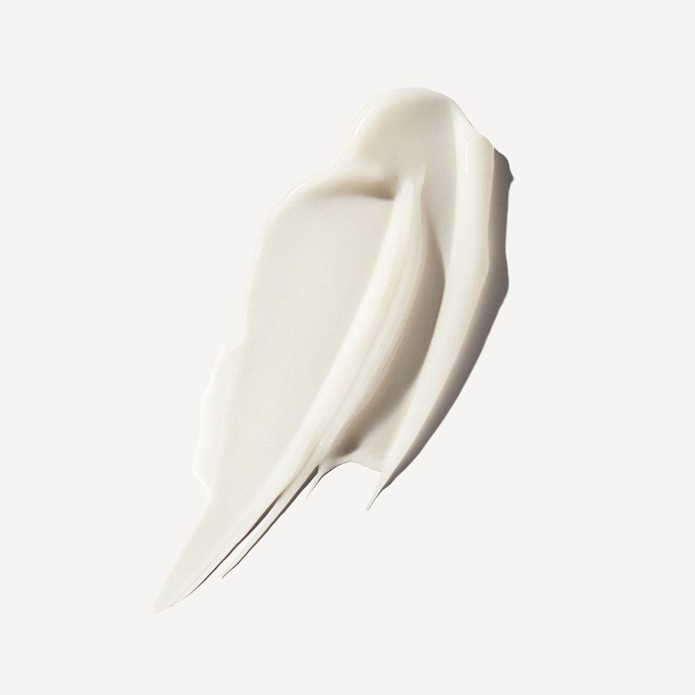 Macchia di balsamo bianco. Texture liscia. Su sfondo chiaro.