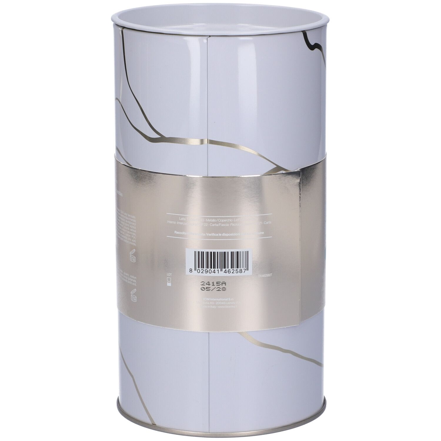 Retro della confezione regalo cilindrica con codice a barre e informazioni sul prodotto su fascia argentata.