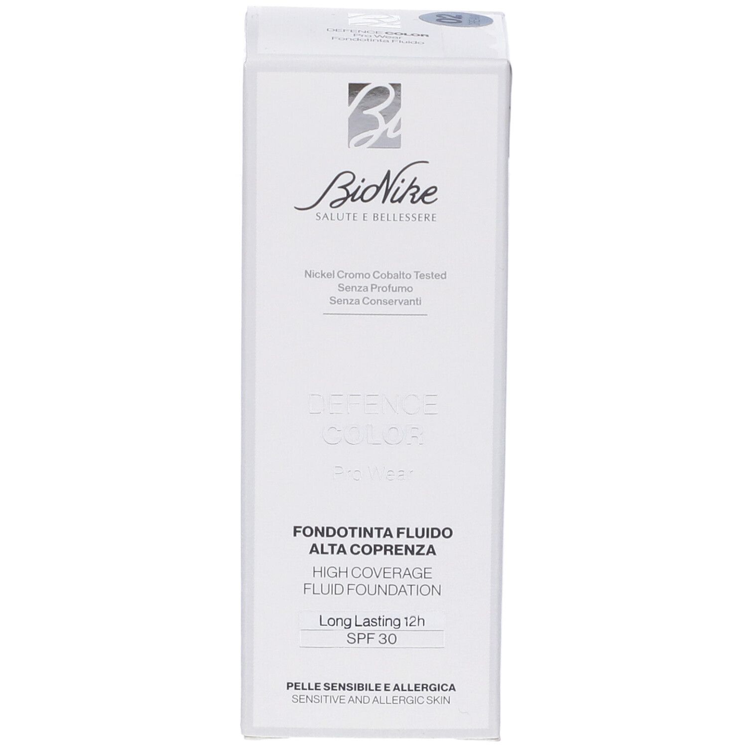 Scatola bianca. Logo Bionike. Defence Color Pro Wear Fondotinta Fluido Alta Coprenza. Testo: SPF 30, pelle sensibile.