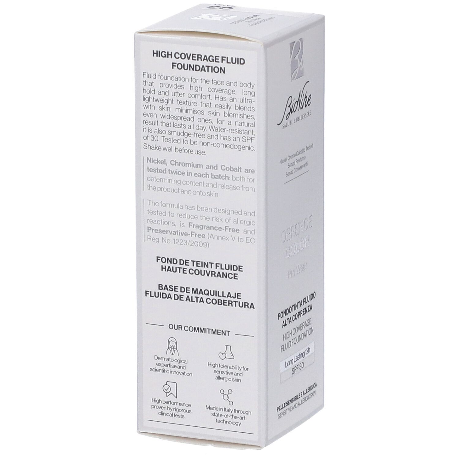 Scatola bianca con testo. 'High Coverage Fluid Foundation'. Testo su ingredienti e proprietà. Marchio Bionike.