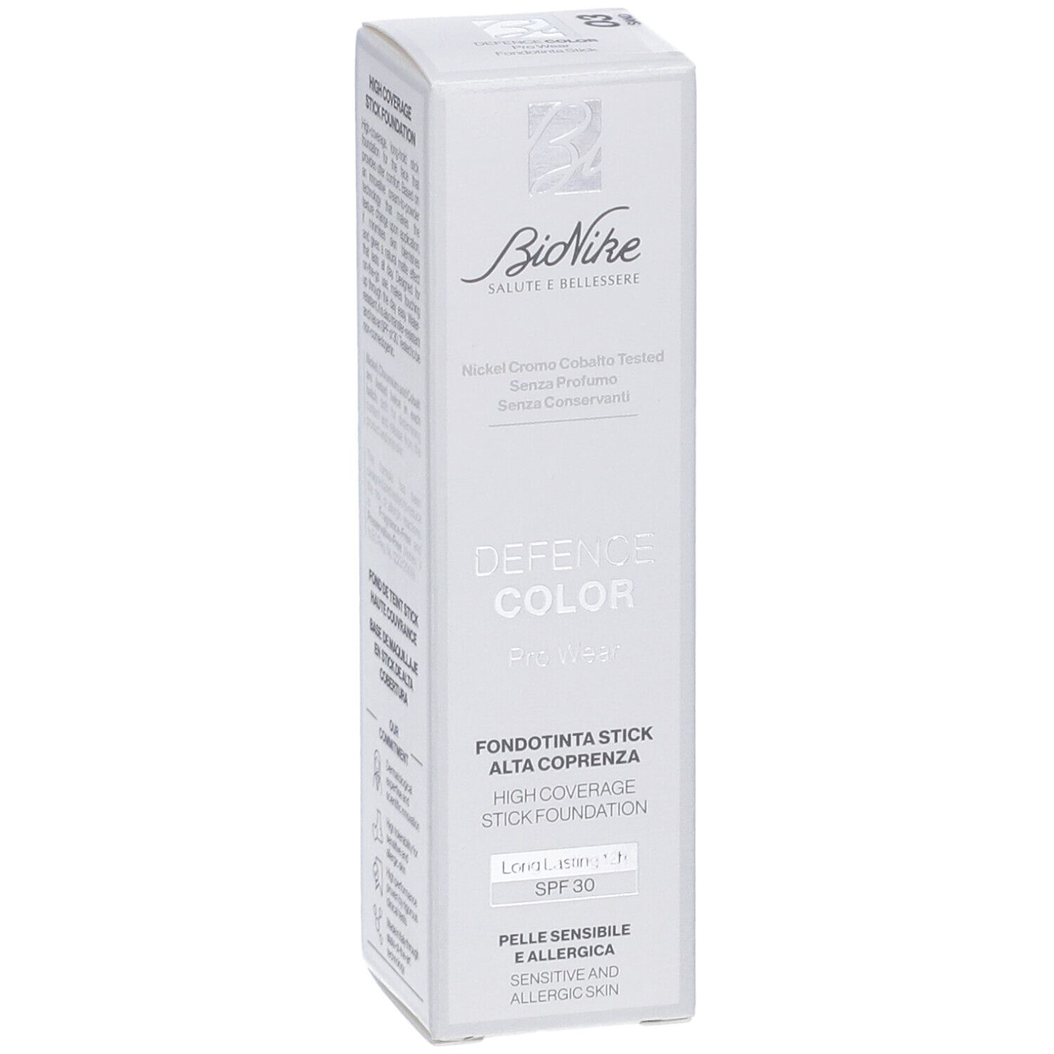 Confezione bianca con informazioni prodotto. Logo Bionike, scritta 'Defence Color', 'Fondotinta Stick Alta Coprenza', SPF 30.