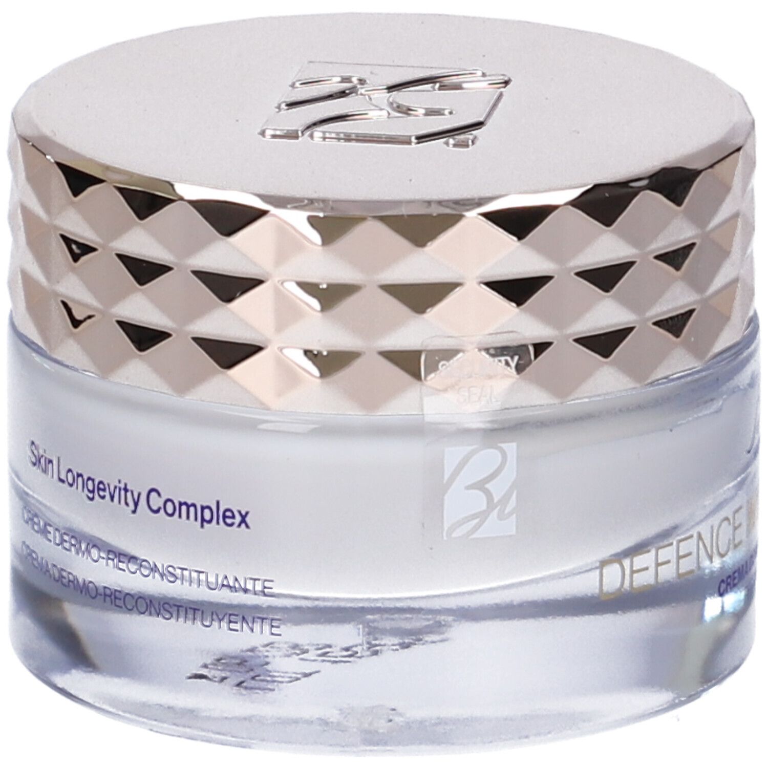 Vasetto di crema con coperchio argentato. Scritte: "Skin Longevity Complex" e "CREME DERMO-RECONSTITUANTE".