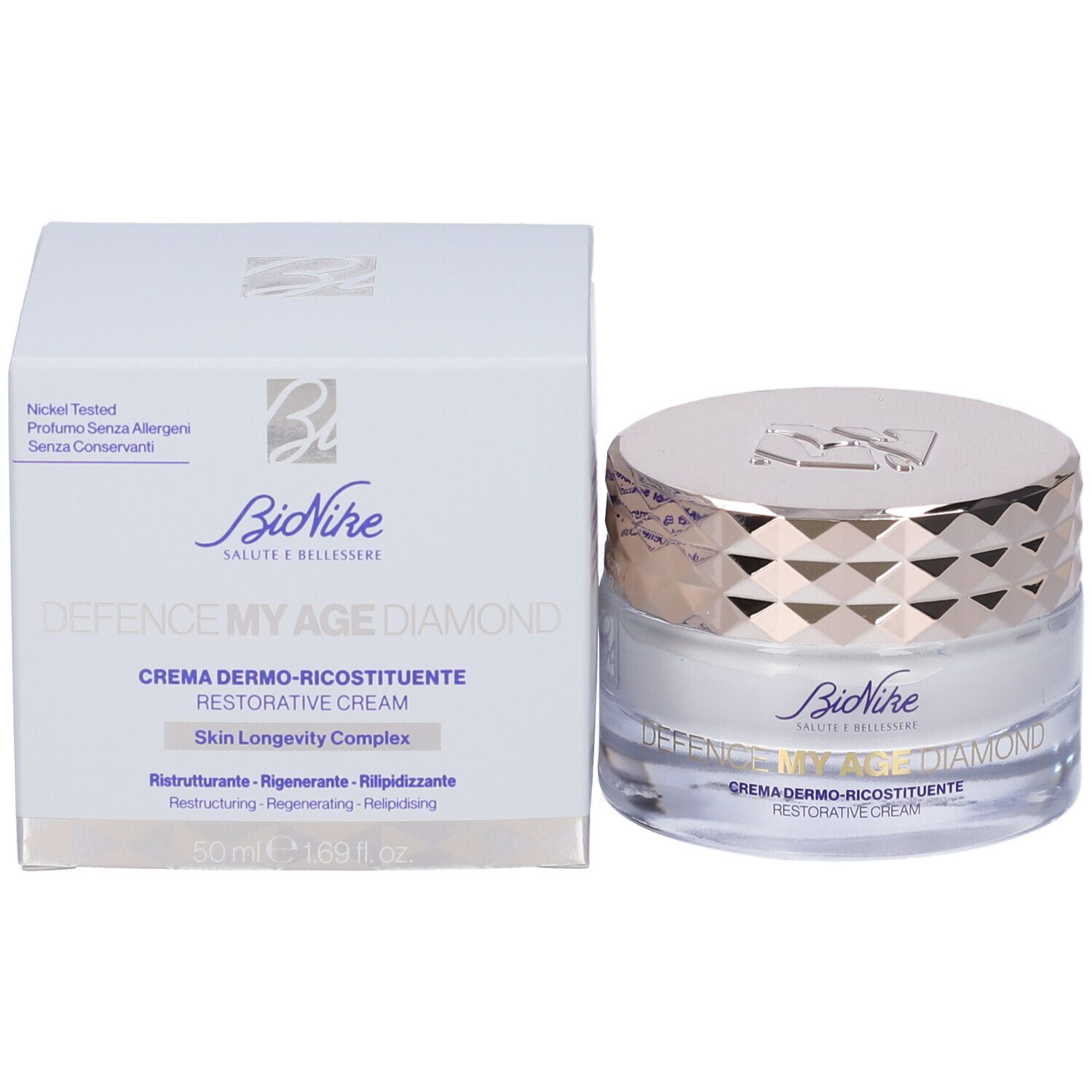 Vasetto di crema e scatola. Sulla scatola: "DEFENCE MY AGE DIAMOND" e "CREMA DERMO-RICOSTITUENTE".