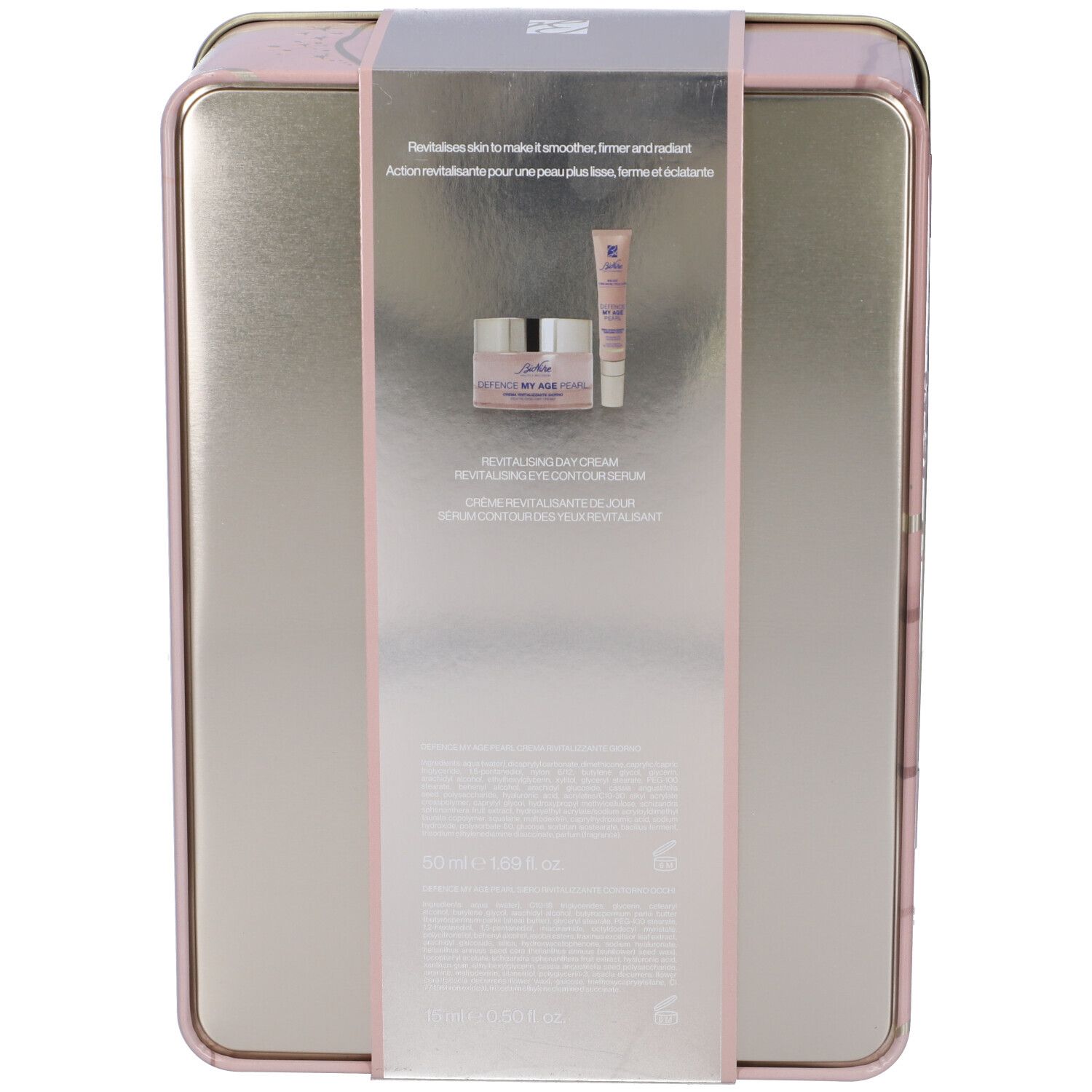 Retro della confezione regalo con immagini dei prodotti. Contiene crema e siero occhi. Testo: Revitalising Day Cream.