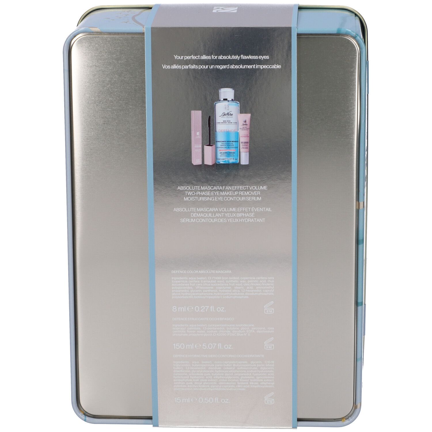 Retro della confezione regalo con prodotti: mascara, struccante occhi, siero occhi. Testo.