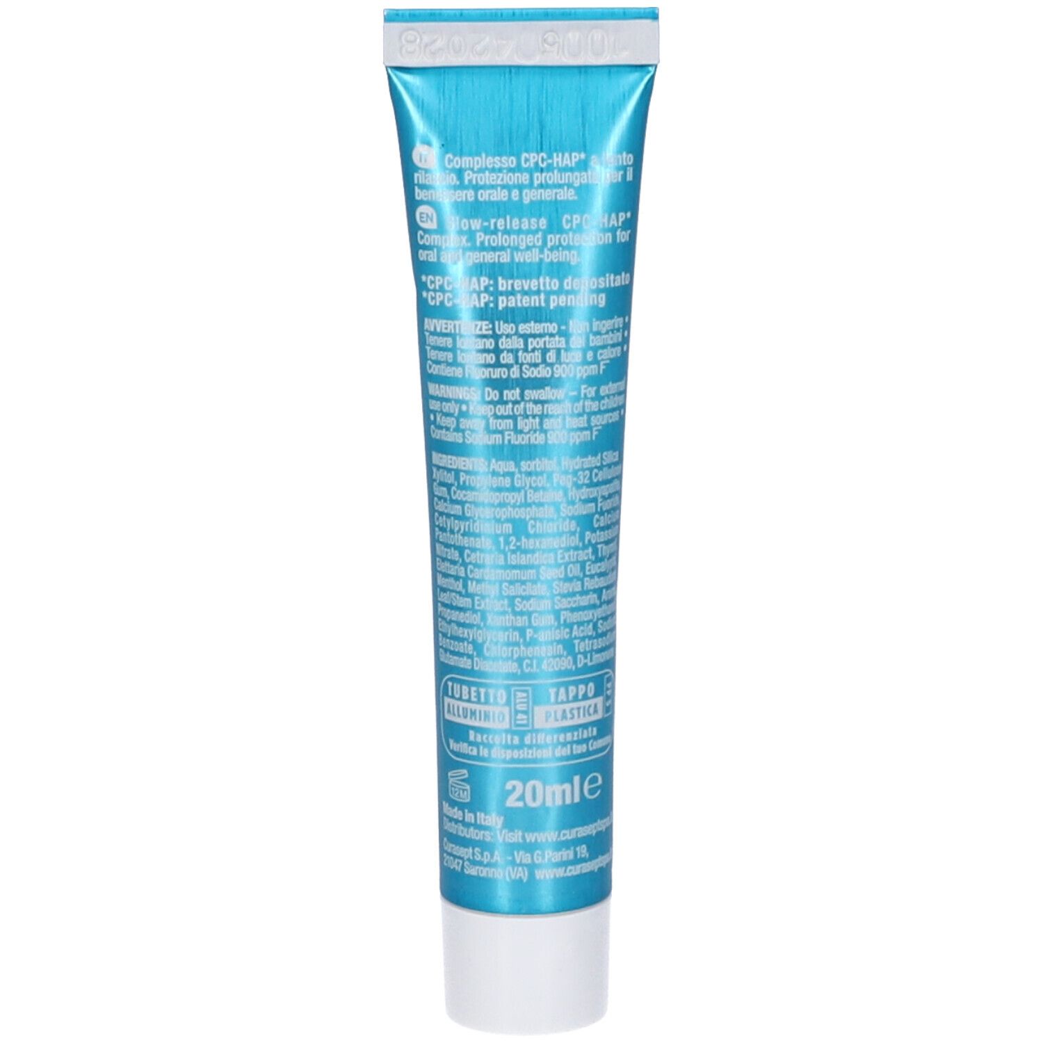 Retro del tubetto di dentifricio. Testo: Ingredienti, 20ml, informazioni produttore. Sfondo blu, testo bianco.