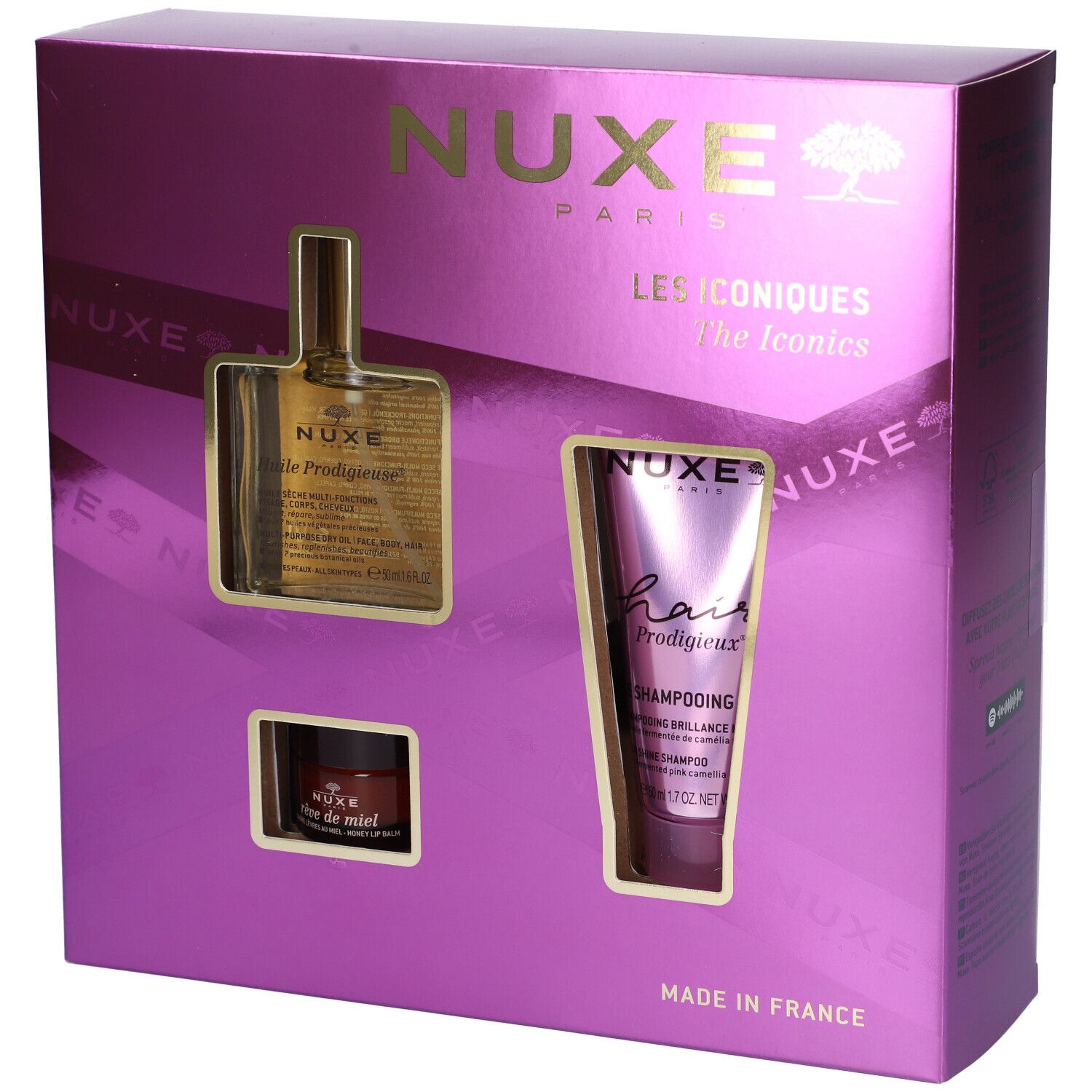 Cofanetto regalo Nuxe con olio, shampoo e crema. Confezione viola con finestre. Marchio Nuxe.