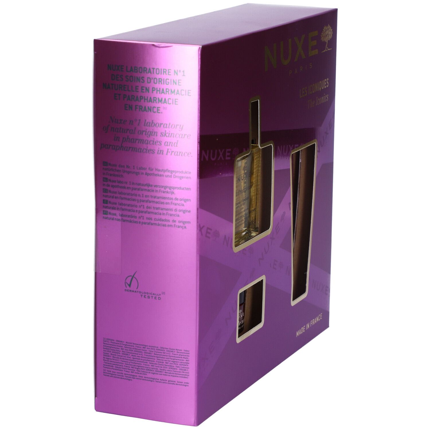 Vista laterale del cofanetto regalo. Confezione viola con testo. Marchio Nuxe. Prodotto in Francia.