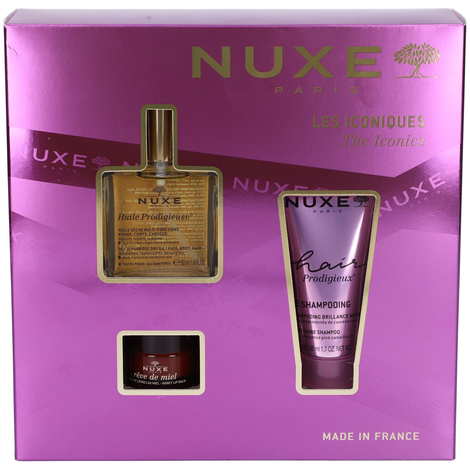 Cofanetto regalo Nuxe con olio, shampoo e crema. Confezione viola con finestre. Marchio Nuxe.