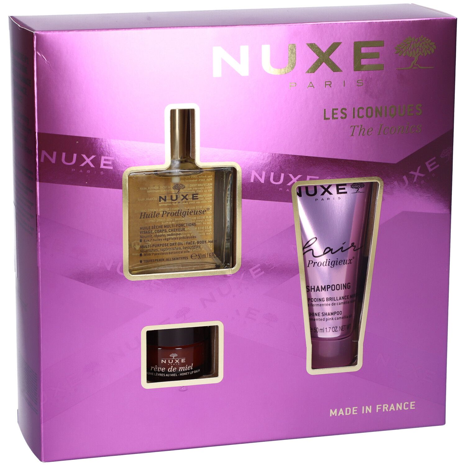 Cofanetto regalo Nuxe con olio, shampoo e crema. Confezione viola con finestre. Marchio Nuxe.