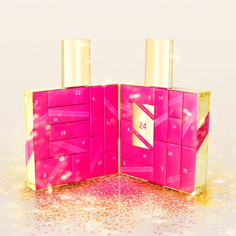 Calendario dell'Avvento a forma di flacone, aperto. 24 caselle numerate, rosa. Flaconi dorati.