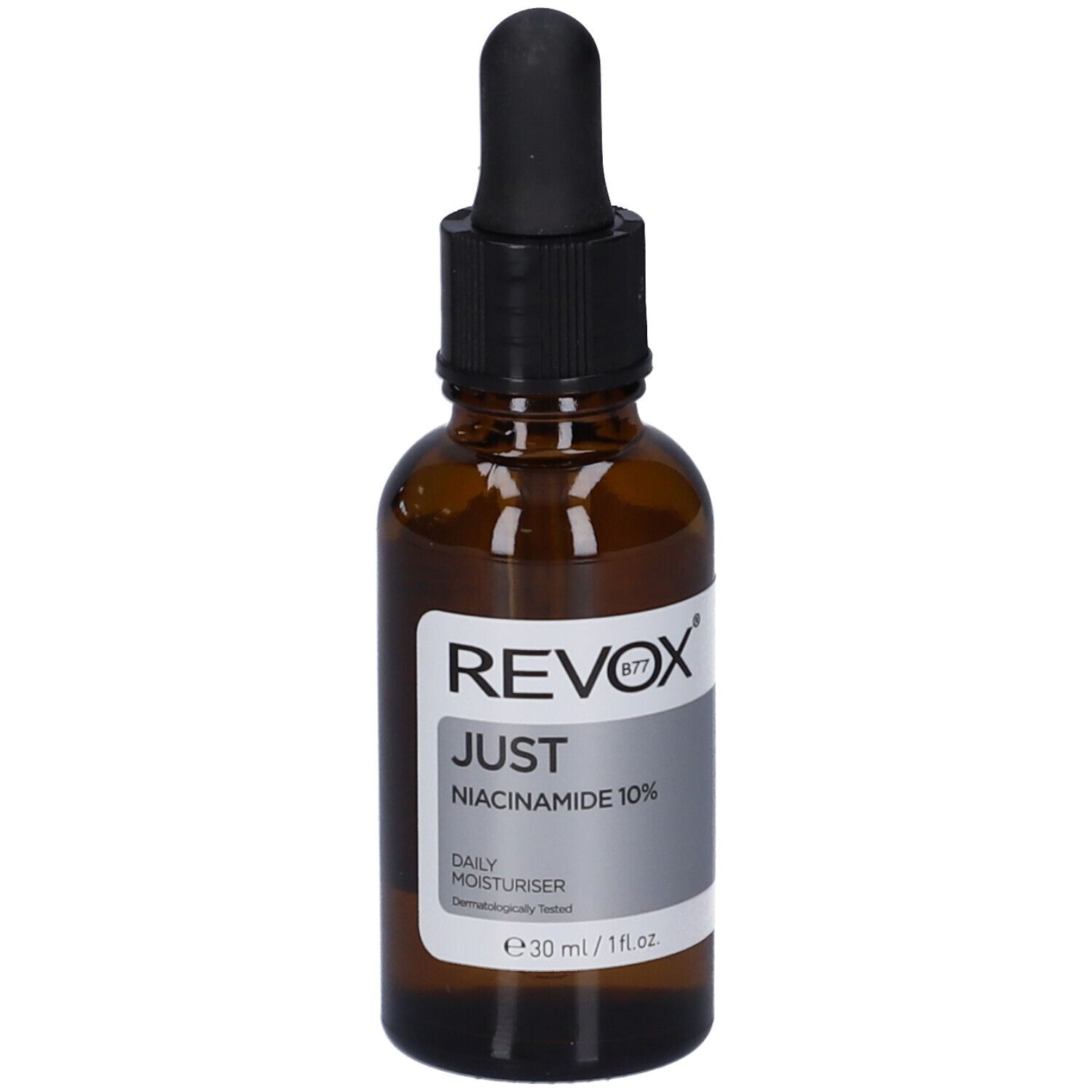 Flacone di vetro marrone con contagocce nero. Etichetta con informazioni sul prodotto. Revox B77 Just Niacinamide 10%.