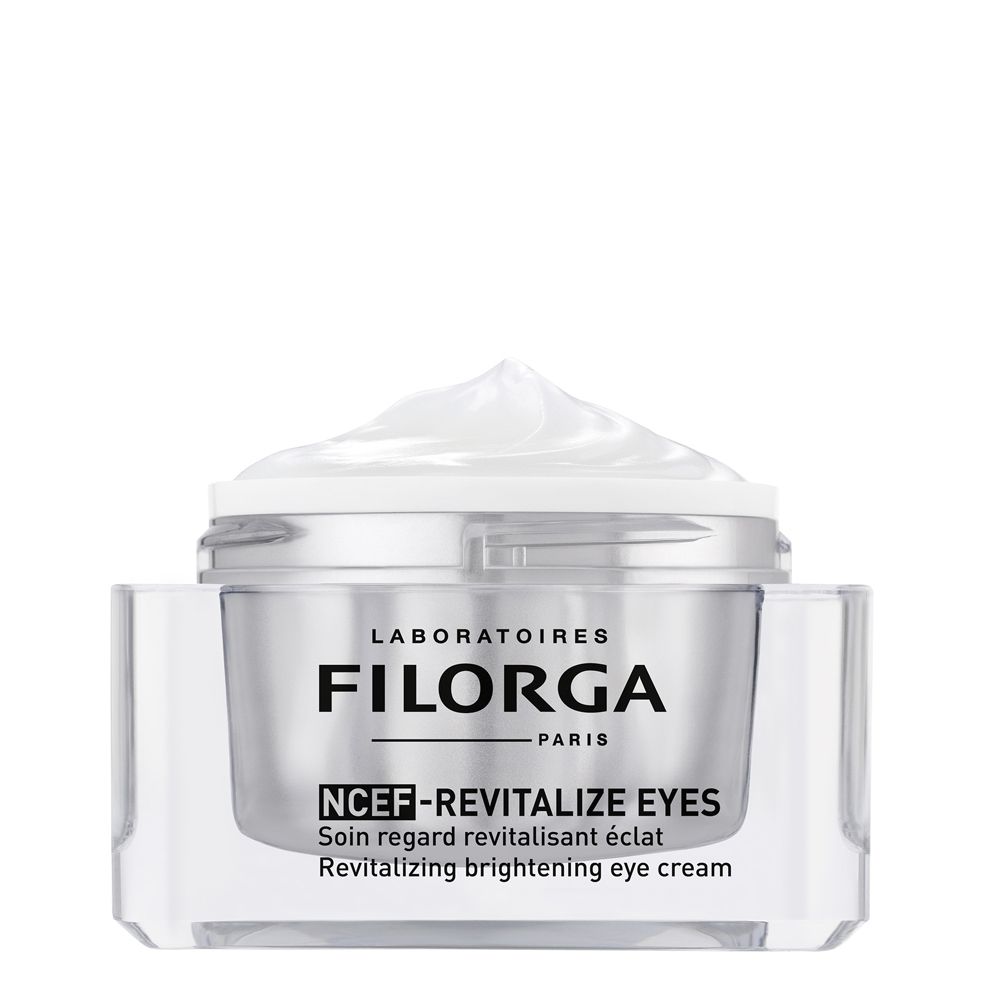 Vasetto di crema con coperchio. Scritta FILORGA, NCEF-REVITALIZE EYES. Crema visibile sul coperchio.