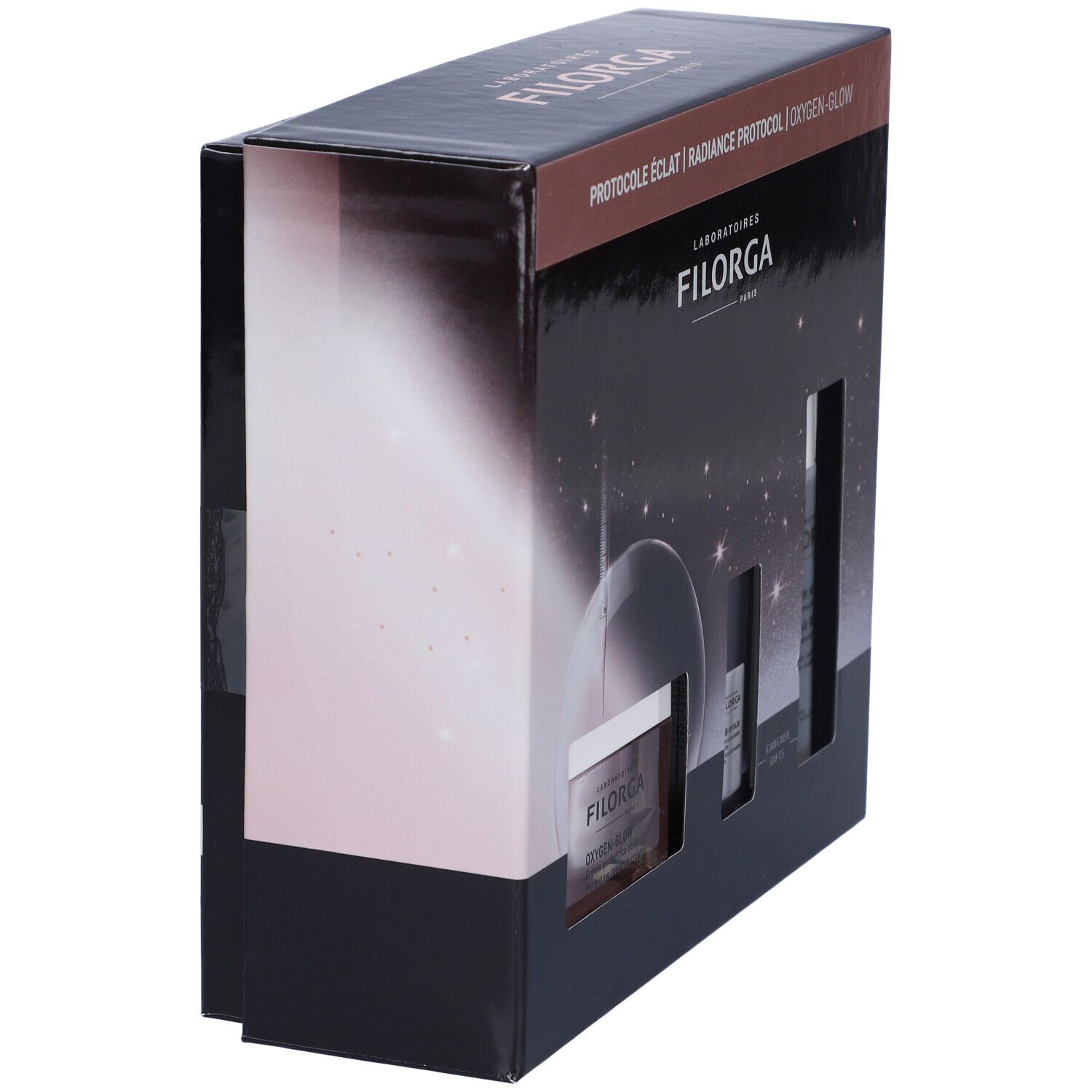 Confezione nera con immagini dei prodotti. Contiene creme e flaconi. Marchio Filorga. Testo: Oxygen-Glow, Radiance Protocol, Regali.