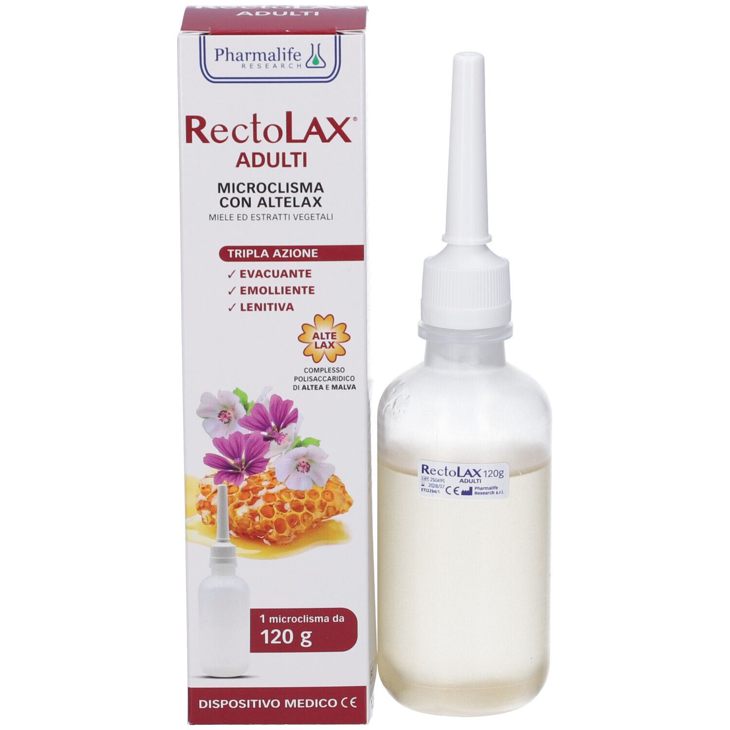 Flacone accanto alla confezione. Confezione con nome del prodotto, ingredienti e illustrazioni.