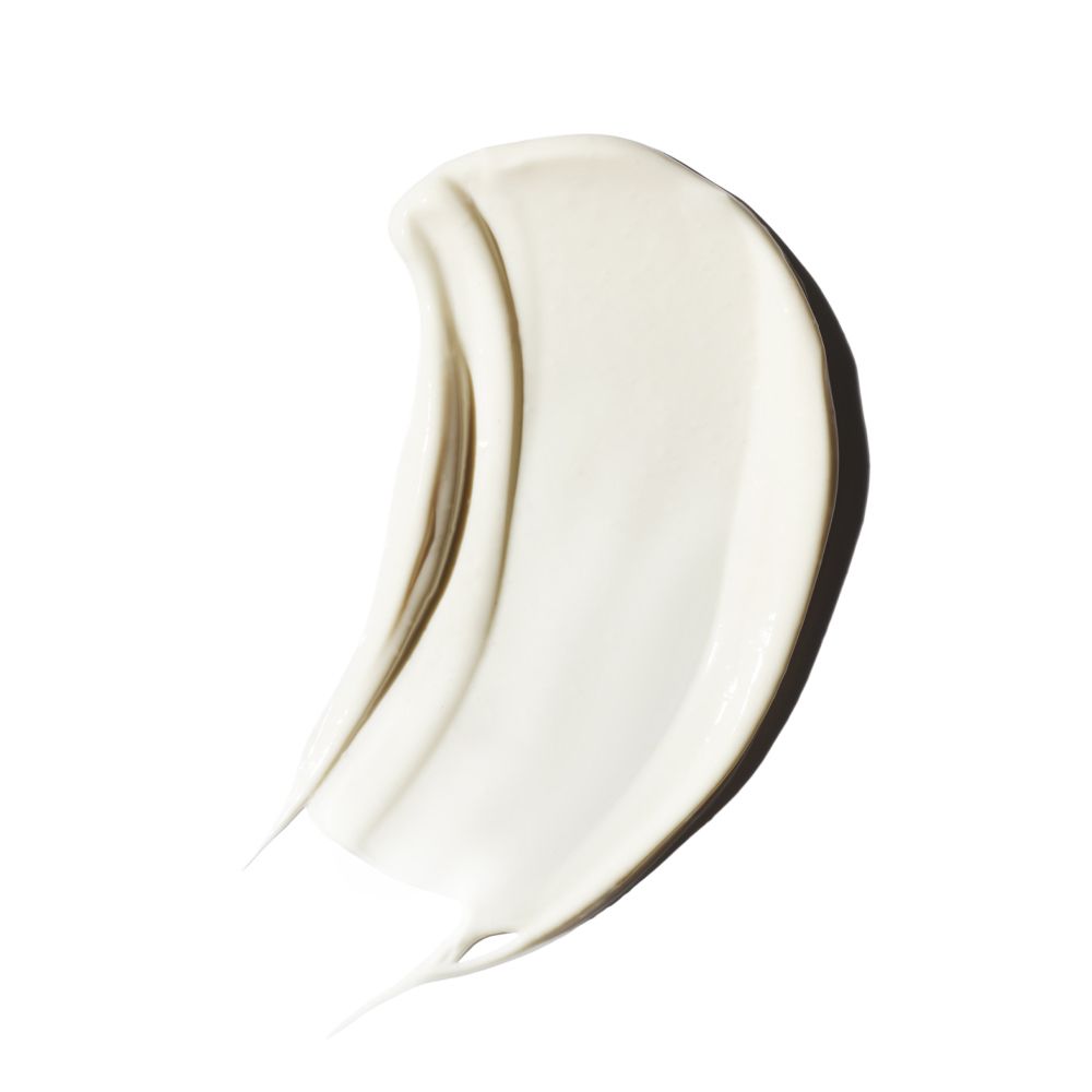 Texture crema biancastra. Applicata in una striscia curva. Superficie liscia.