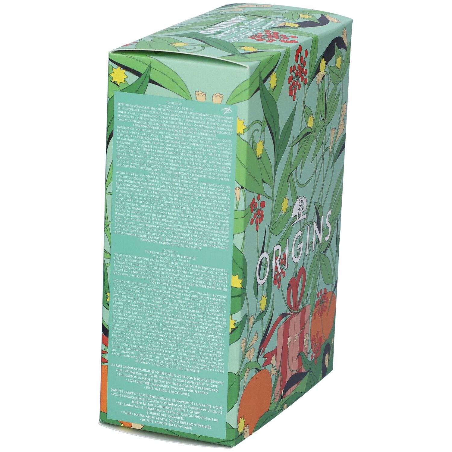 Lato della confezione regalo con testo. Motivo floreale e logo "ORIGINS". Testo multilingue.