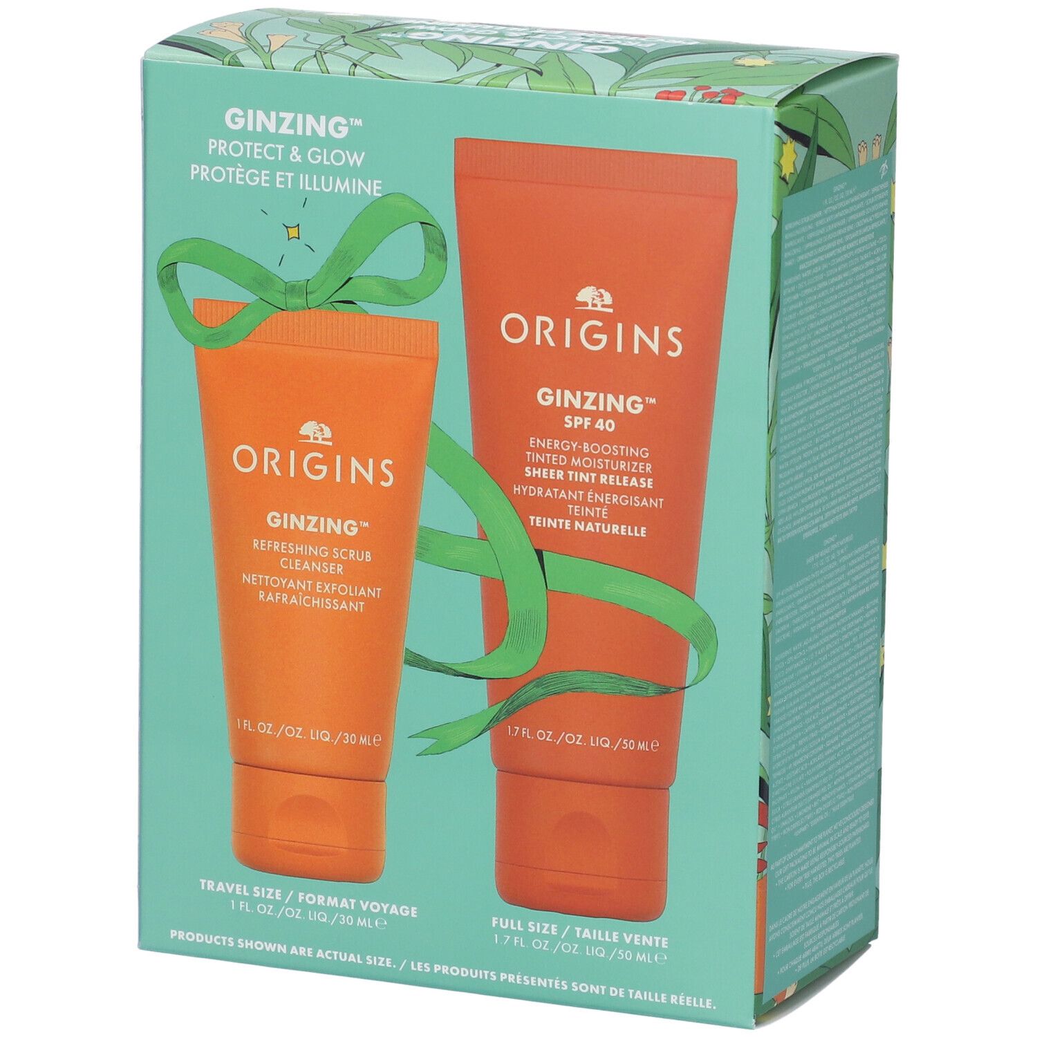 Set regalo con due tubi. Loghi "GINZING" e "ORIGINS". Un tubo arancione, un tubo rosso.