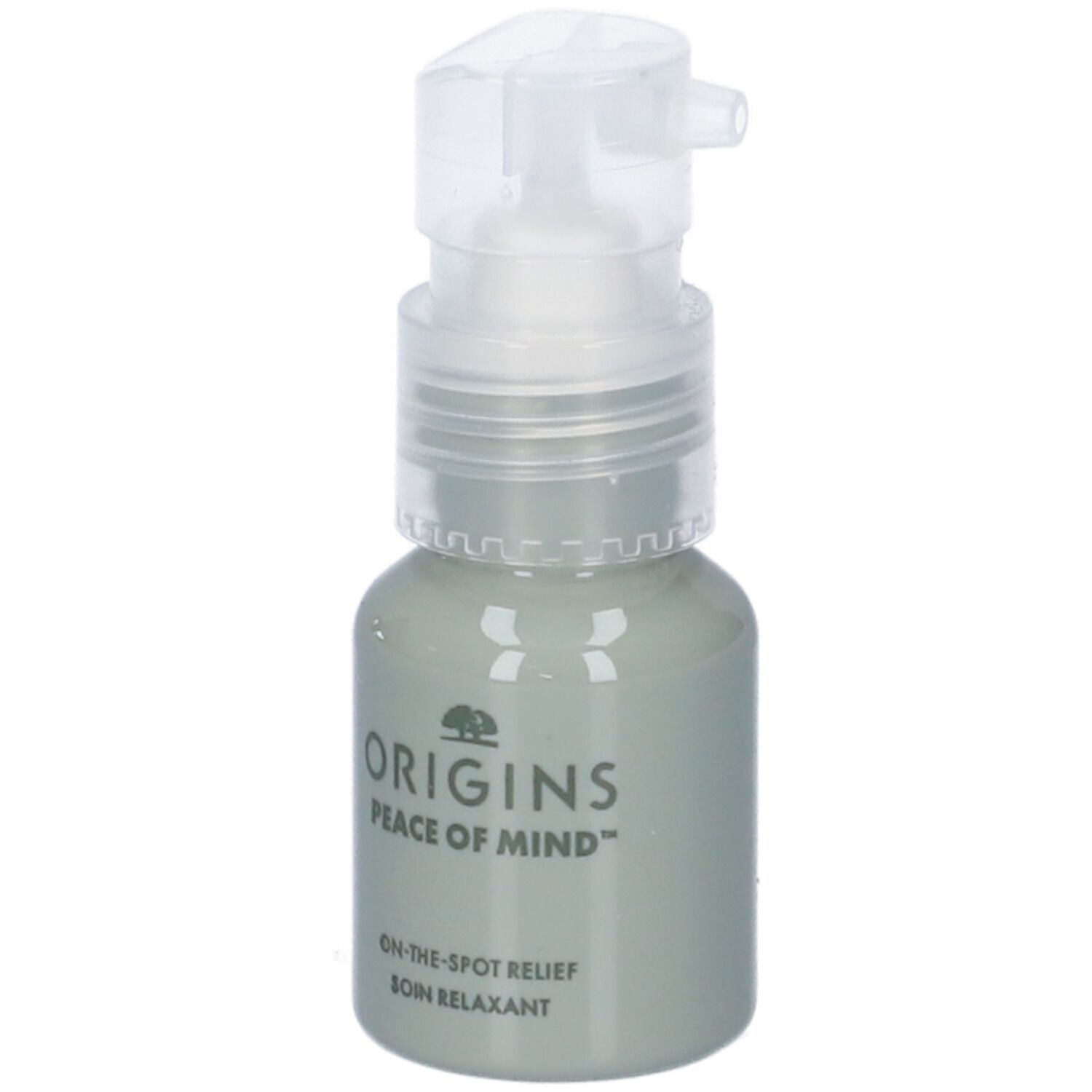 Flacone grigio con pompa. Scritte: ORIGINS, PEACE OF MIND, ON-THE-SPOT RELIEF, SOIN RELAXANT.