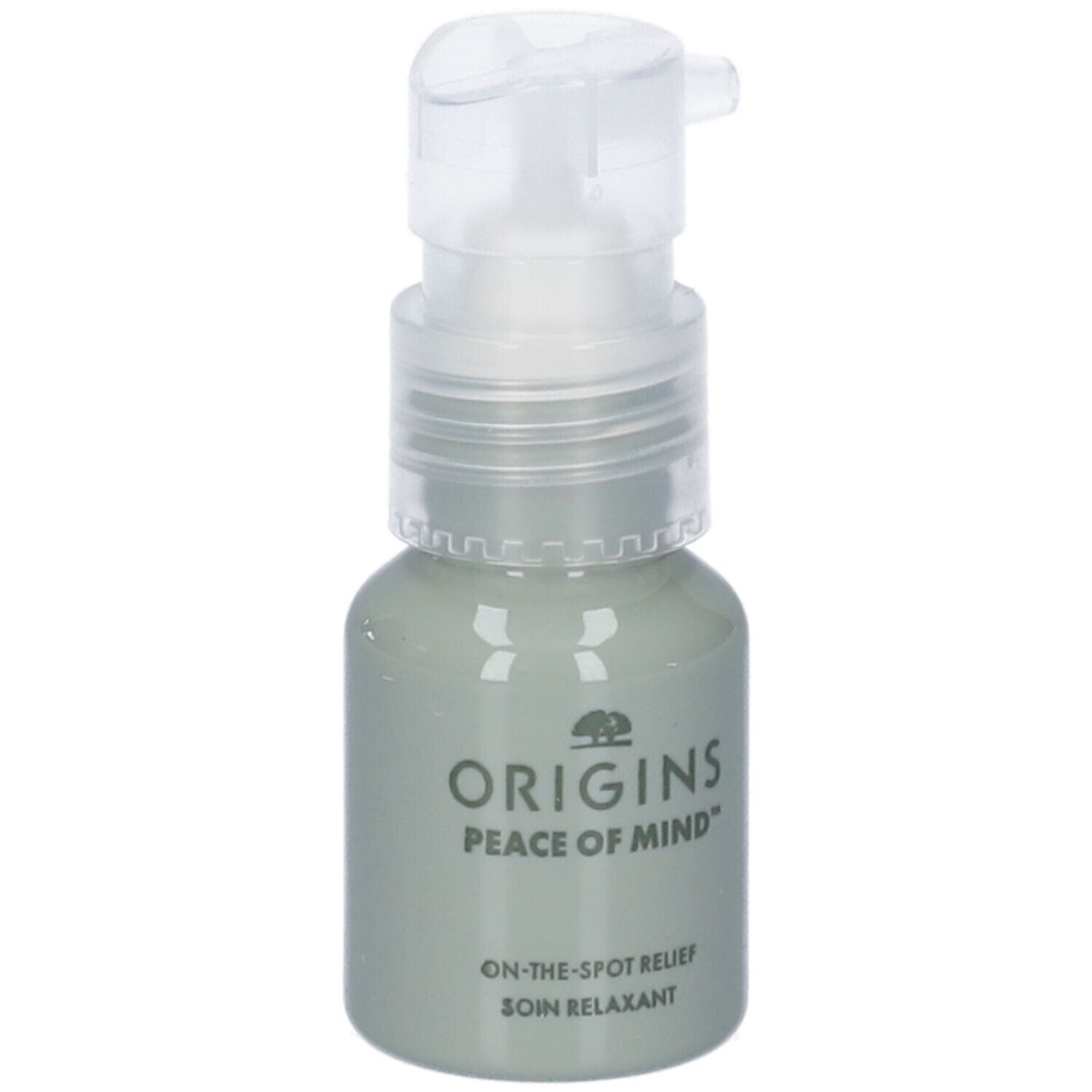 Flacone grigio con pompa. Scritte: ORIGINS, PEACE OF MIND, ON-THE-SPOT RELIEF, SOIN RELAXANT.