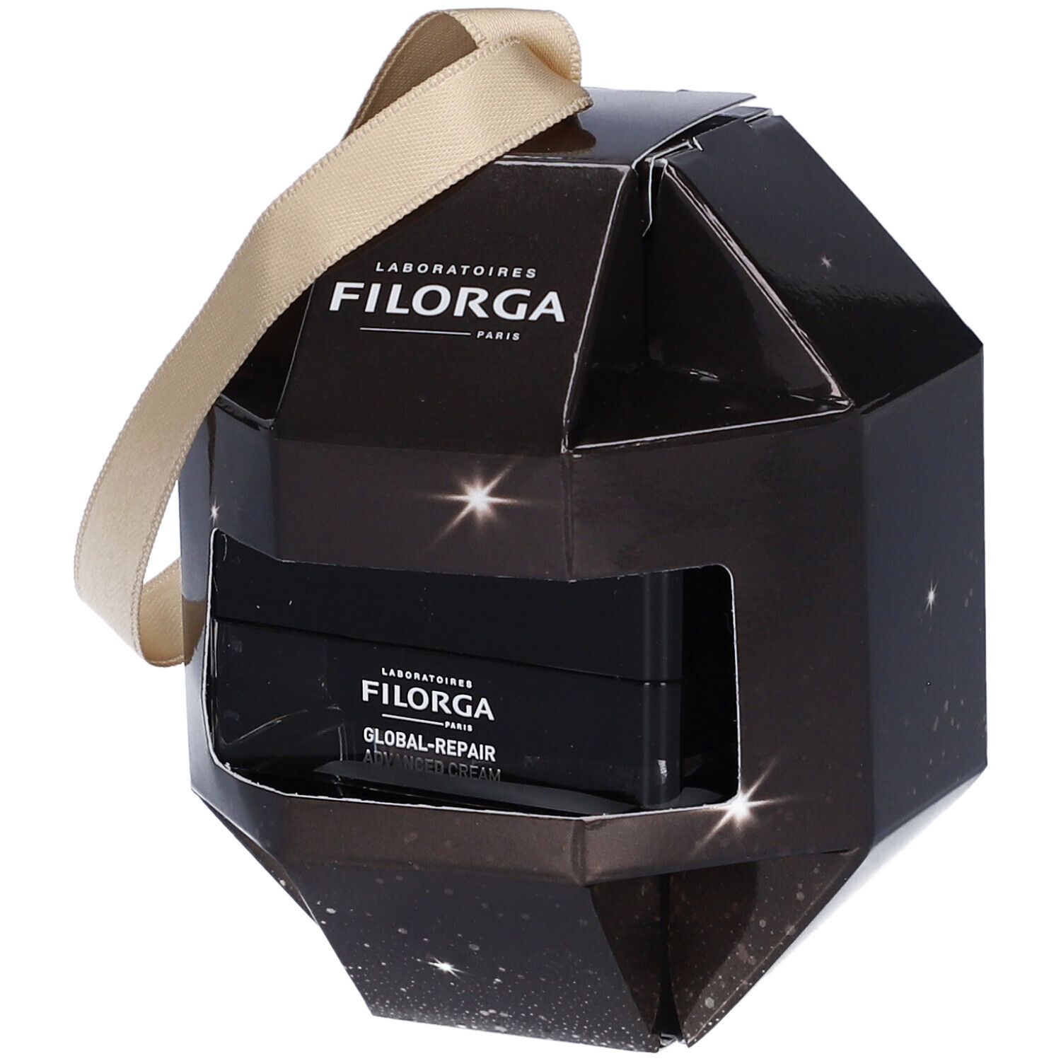 Confezione regalo nera Filorga. Forma geometrica con nastro dorato. Prodotto visibile attraverso una finestra.