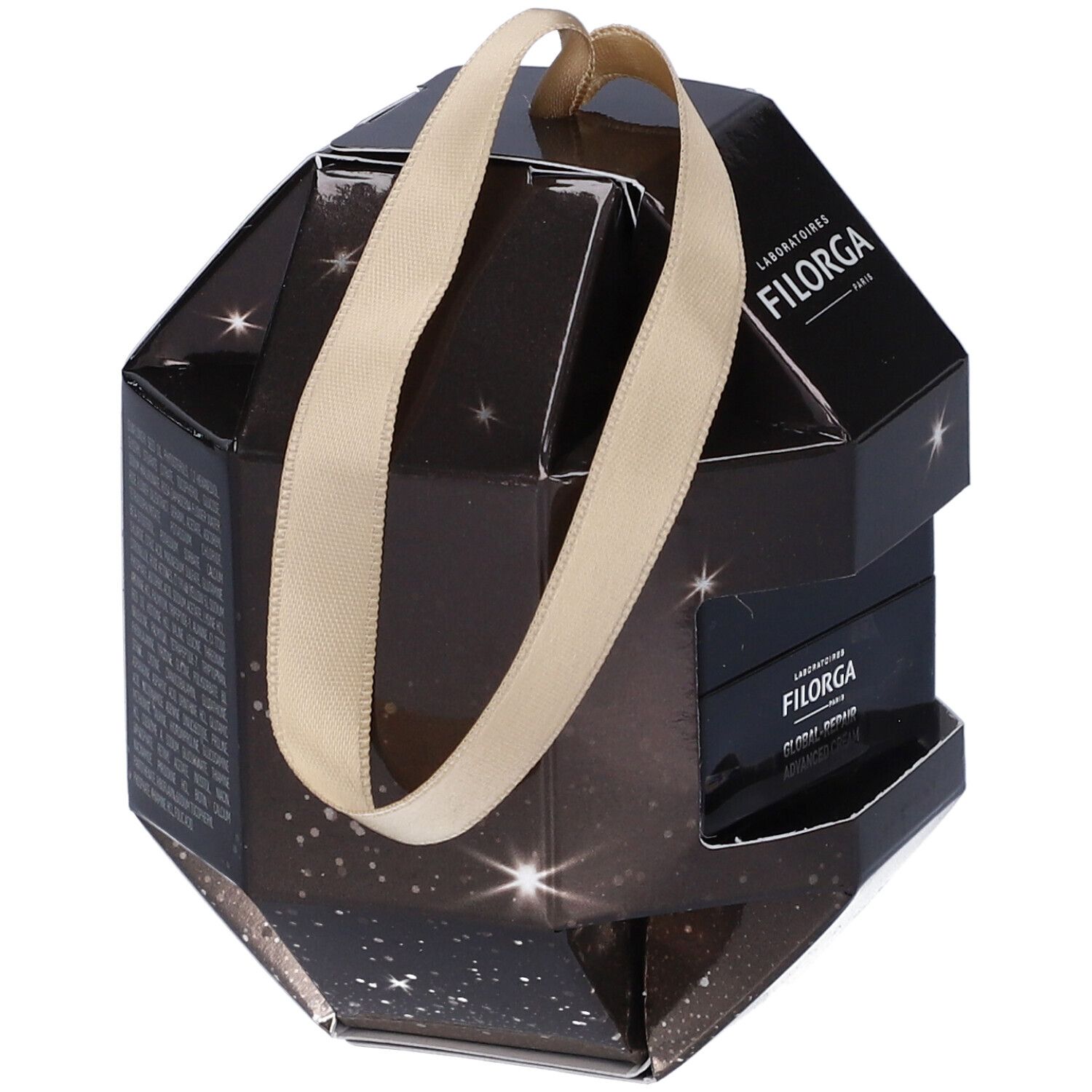 Confezione regalo Filorga. Forma geometrica, nera, nastro dorato. Testo sul retro.